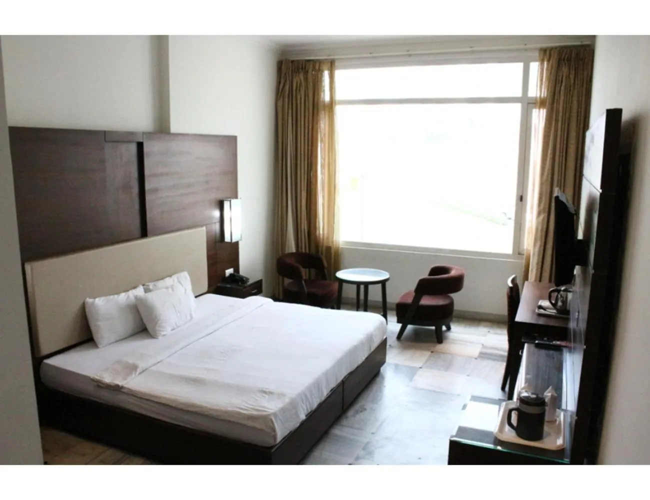 Bed in AMR Hotel, Katra