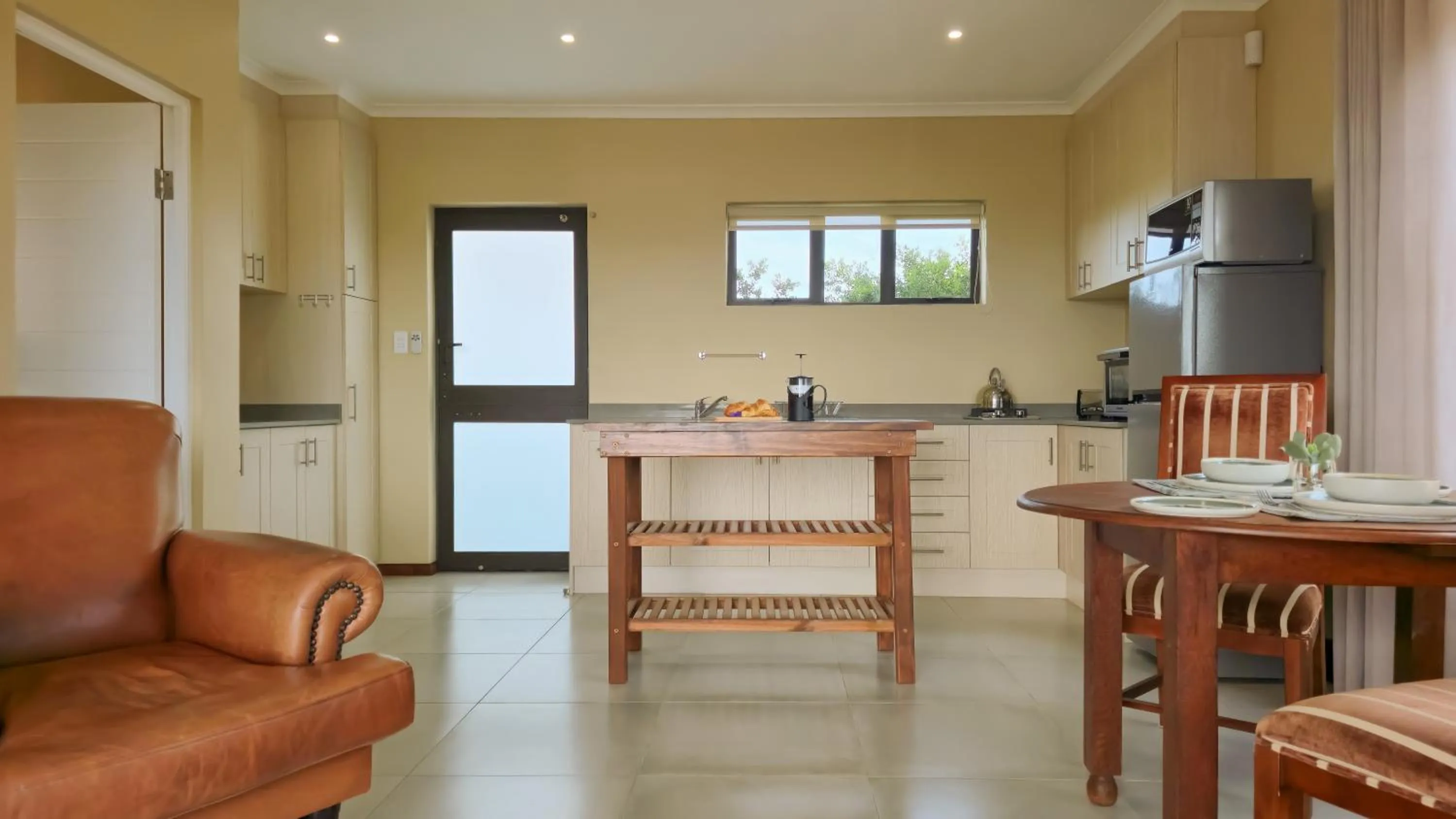Kitchen or kitchenette in Hitgeheim Garden Cottages