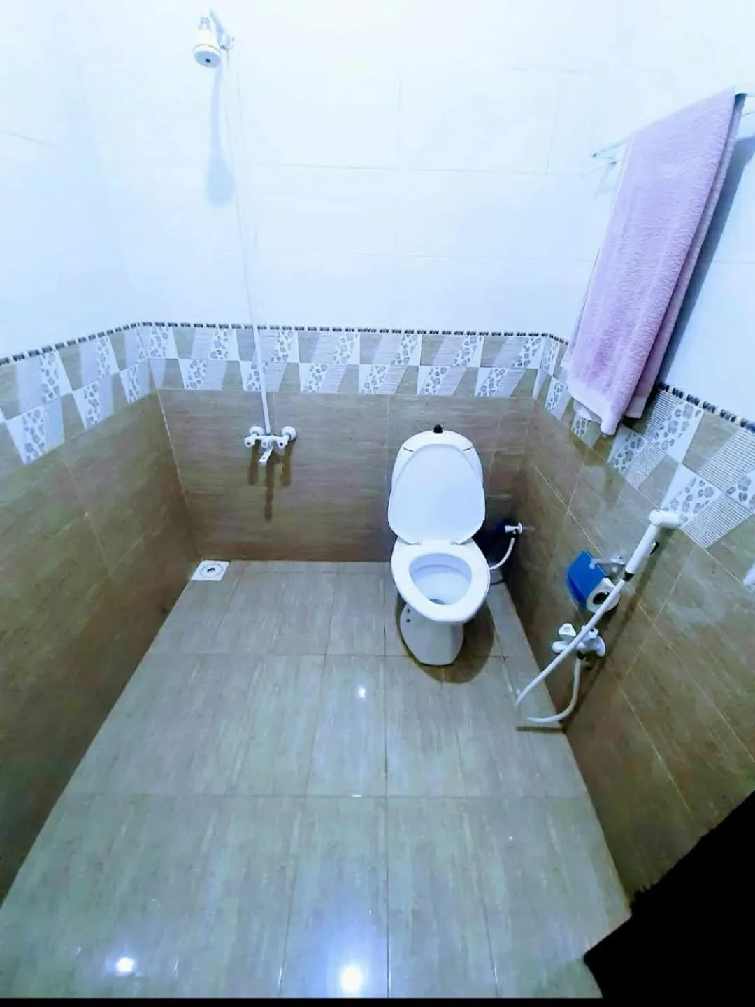 Shower in Galaxy Inn Guest House