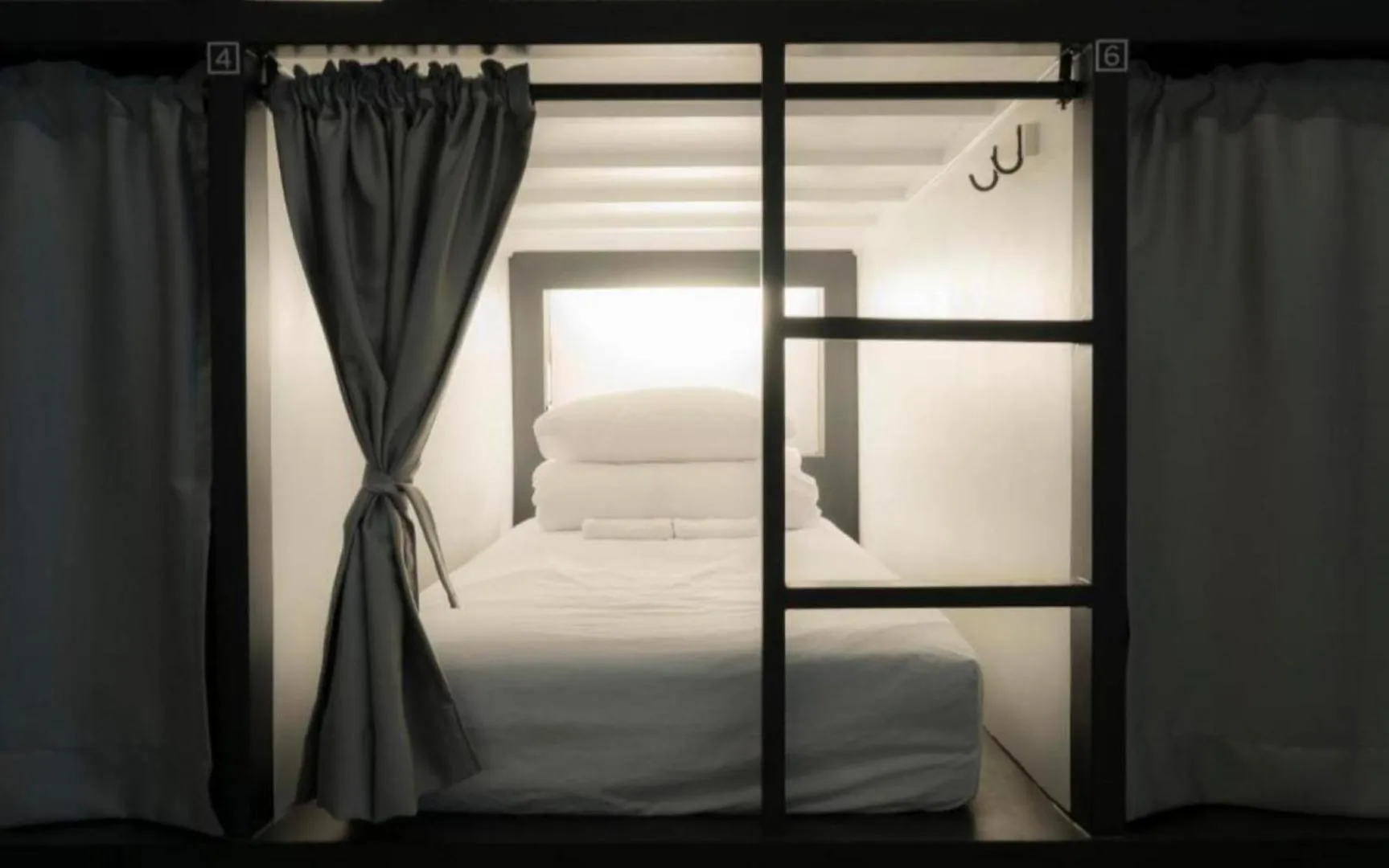 Bed in CANVAS BLACK Guesthouse