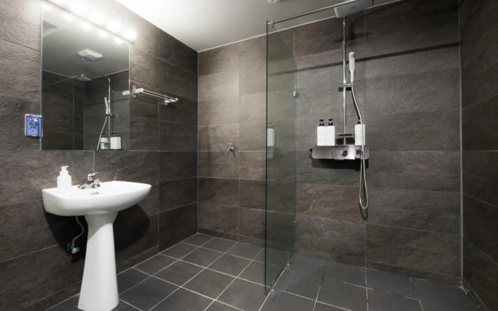 Shower in CANVAS BLACK Guesthouse