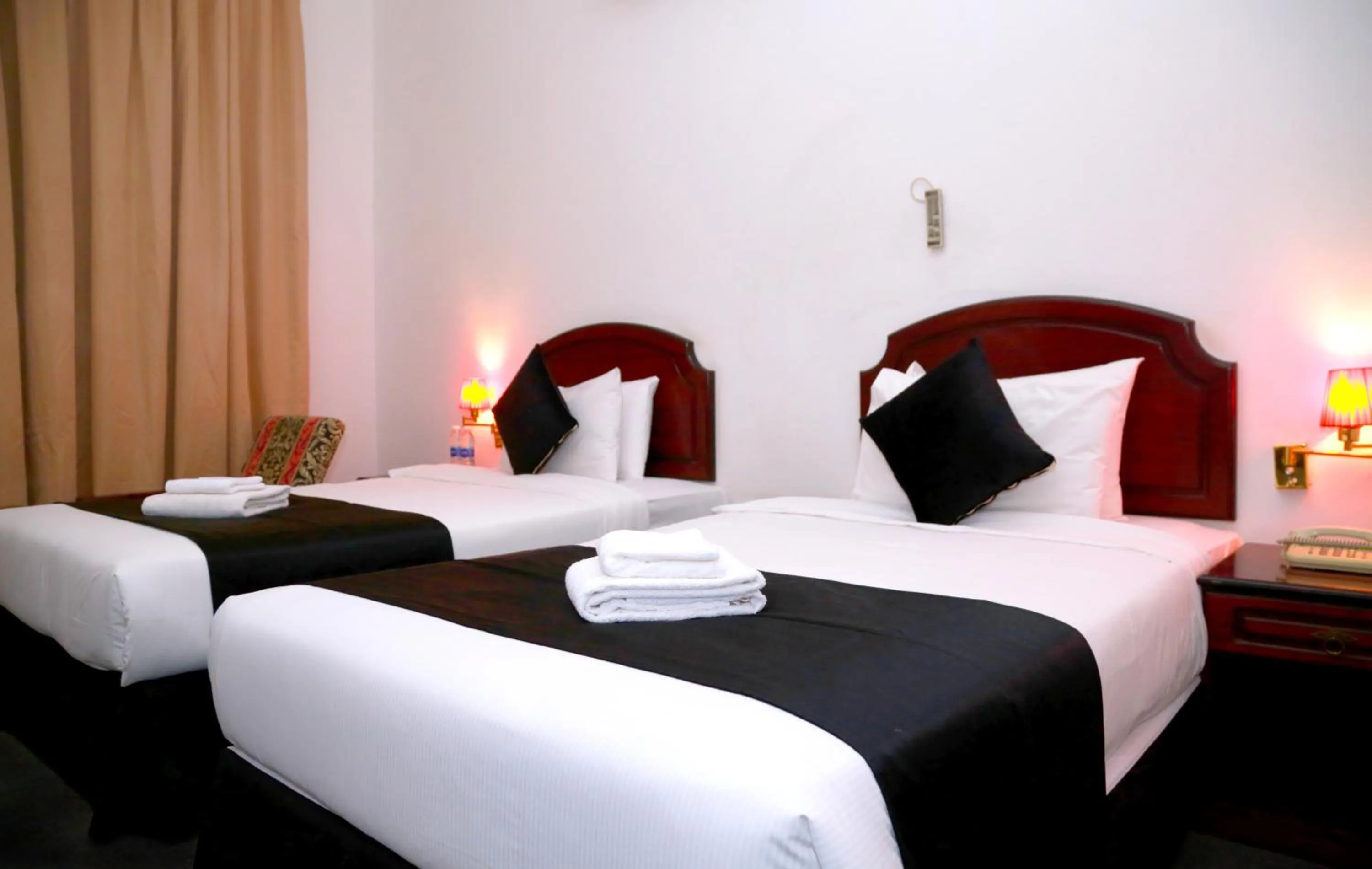 Bed in Ibri Oasis Hotel