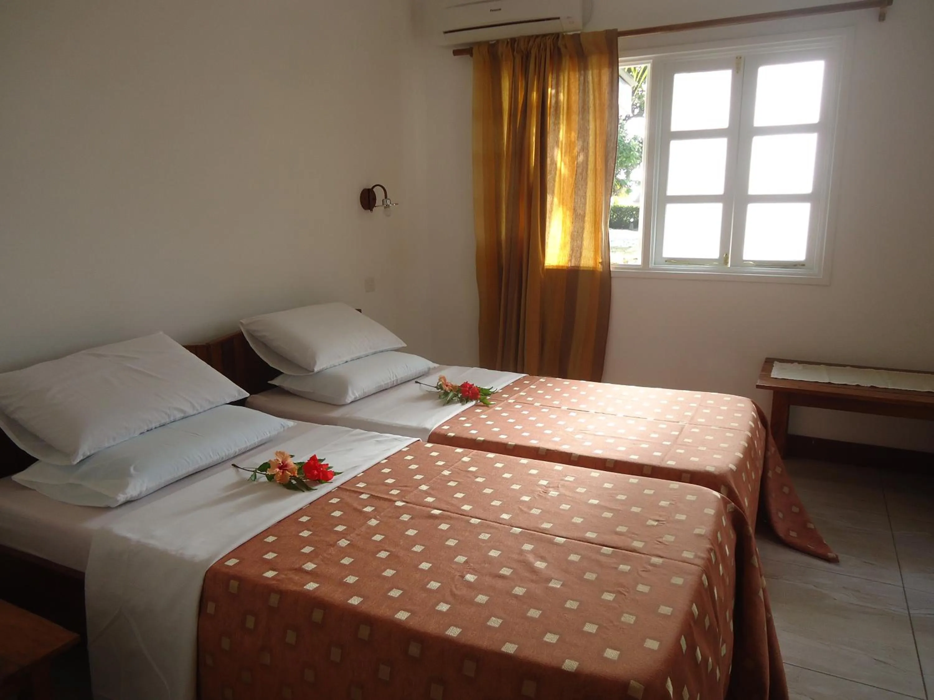 Bed in Chez Michellin Pensions Residence