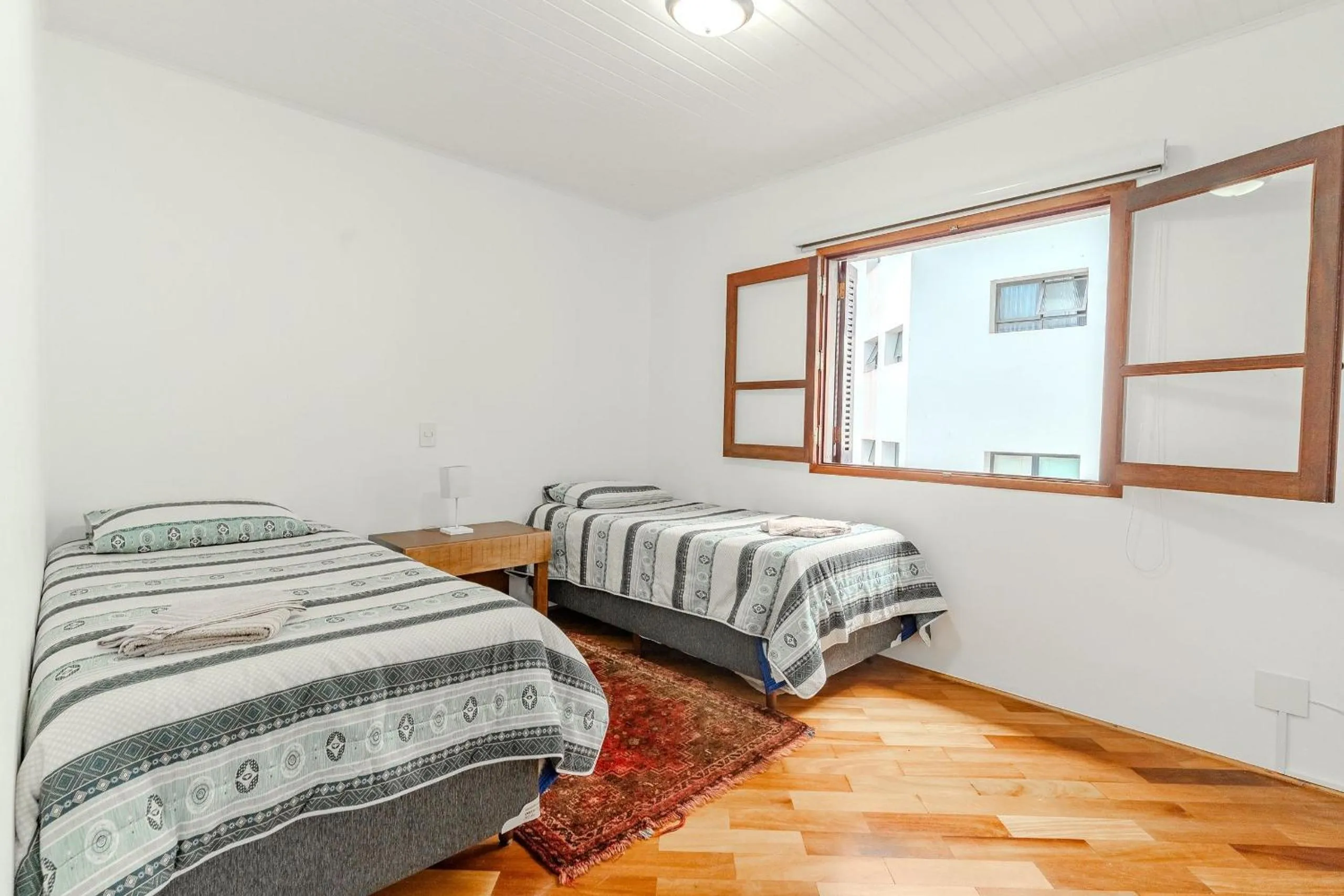 Bed in Lindo Apartamento próximo ao centro do Capivari