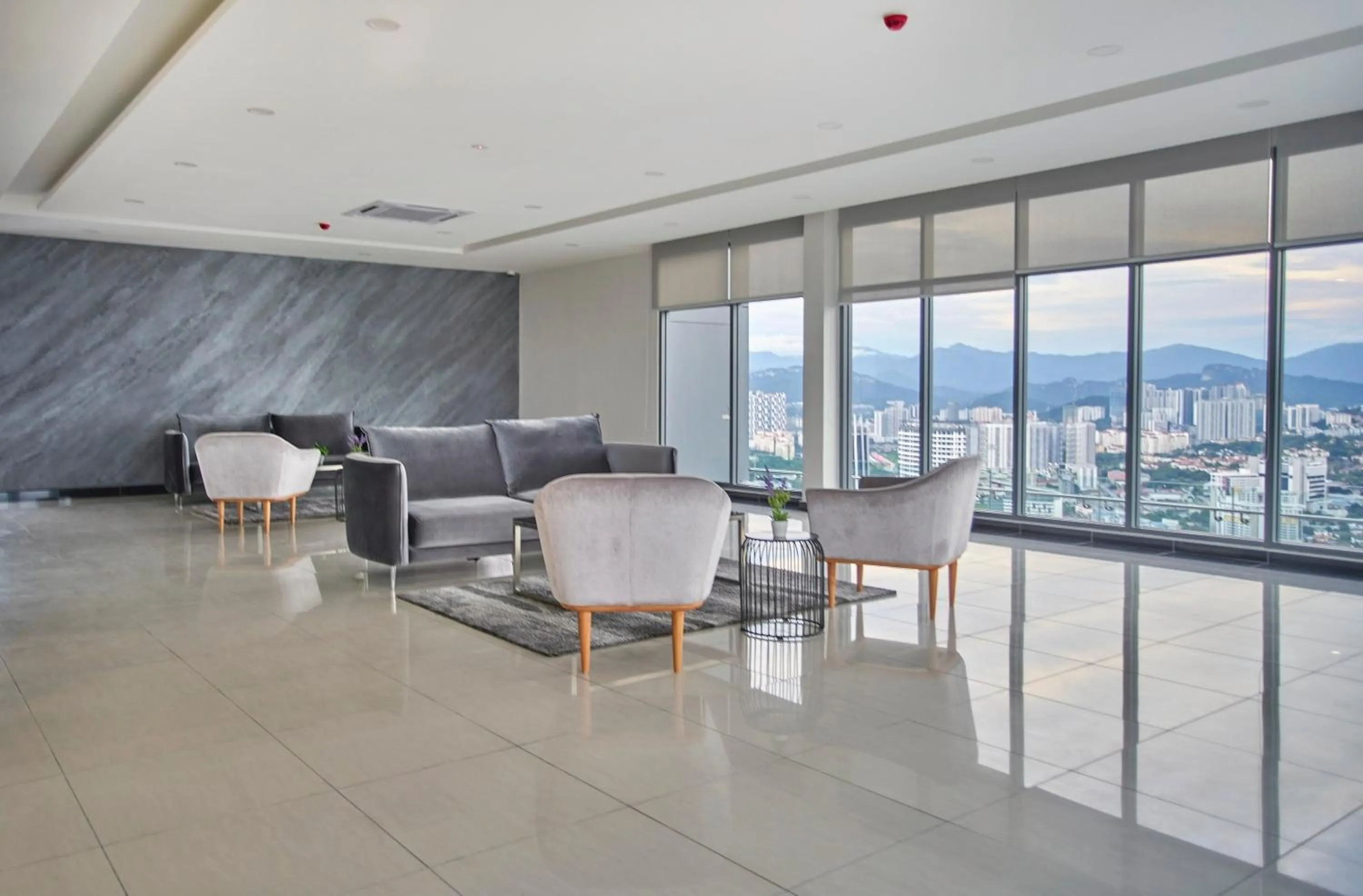 Seating area in Royce Residence KLCC by Cobnb