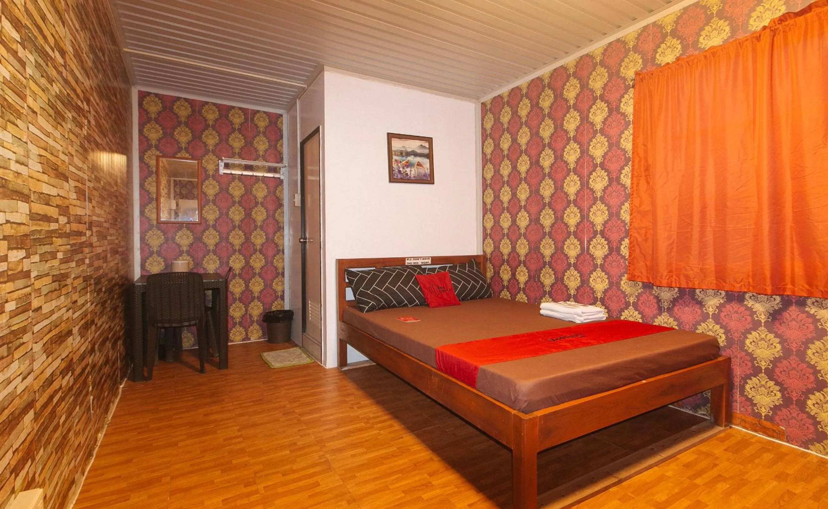 Bed in RedDoorz @ Boondocks Cabins Resort