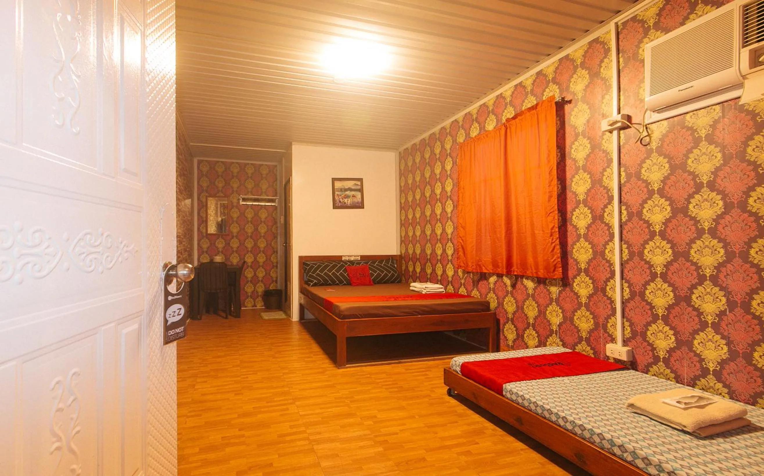 Photo of the whole room, Bed in RedDoorz @ Boondocks Cabins Resort