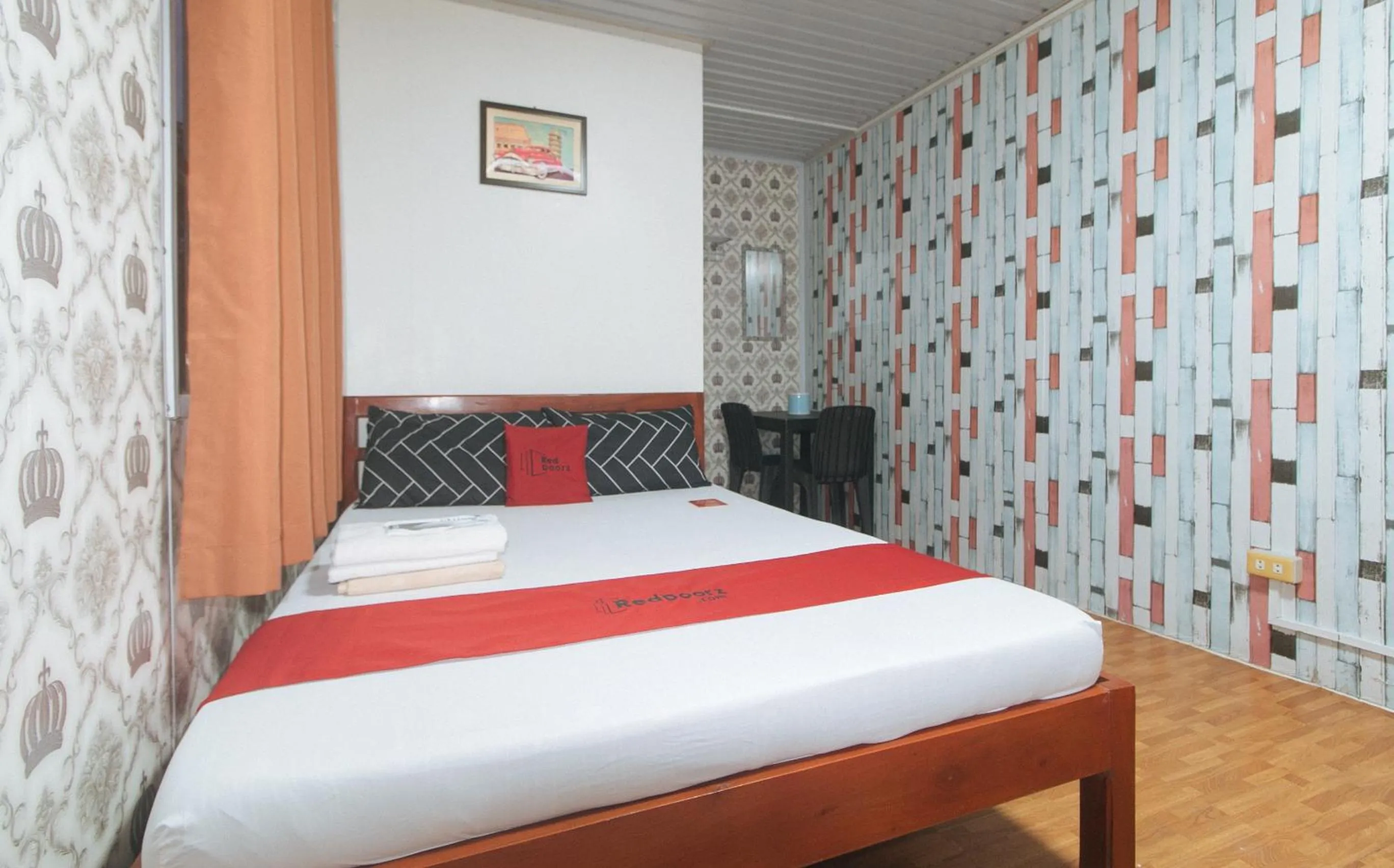 Photo of the whole room, Bed in RedDoorz @ Boondocks Cabins Resort