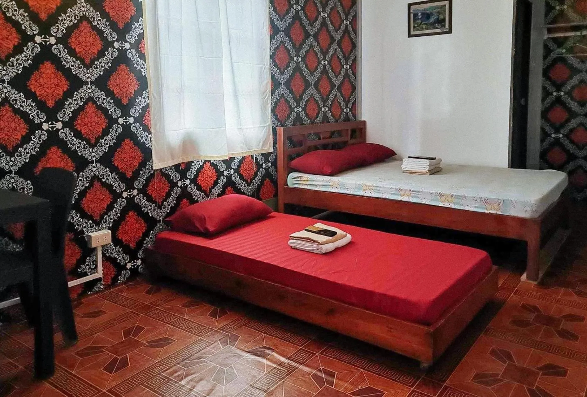 Bed in RedDoorz @ Boondocks Cabins Resort