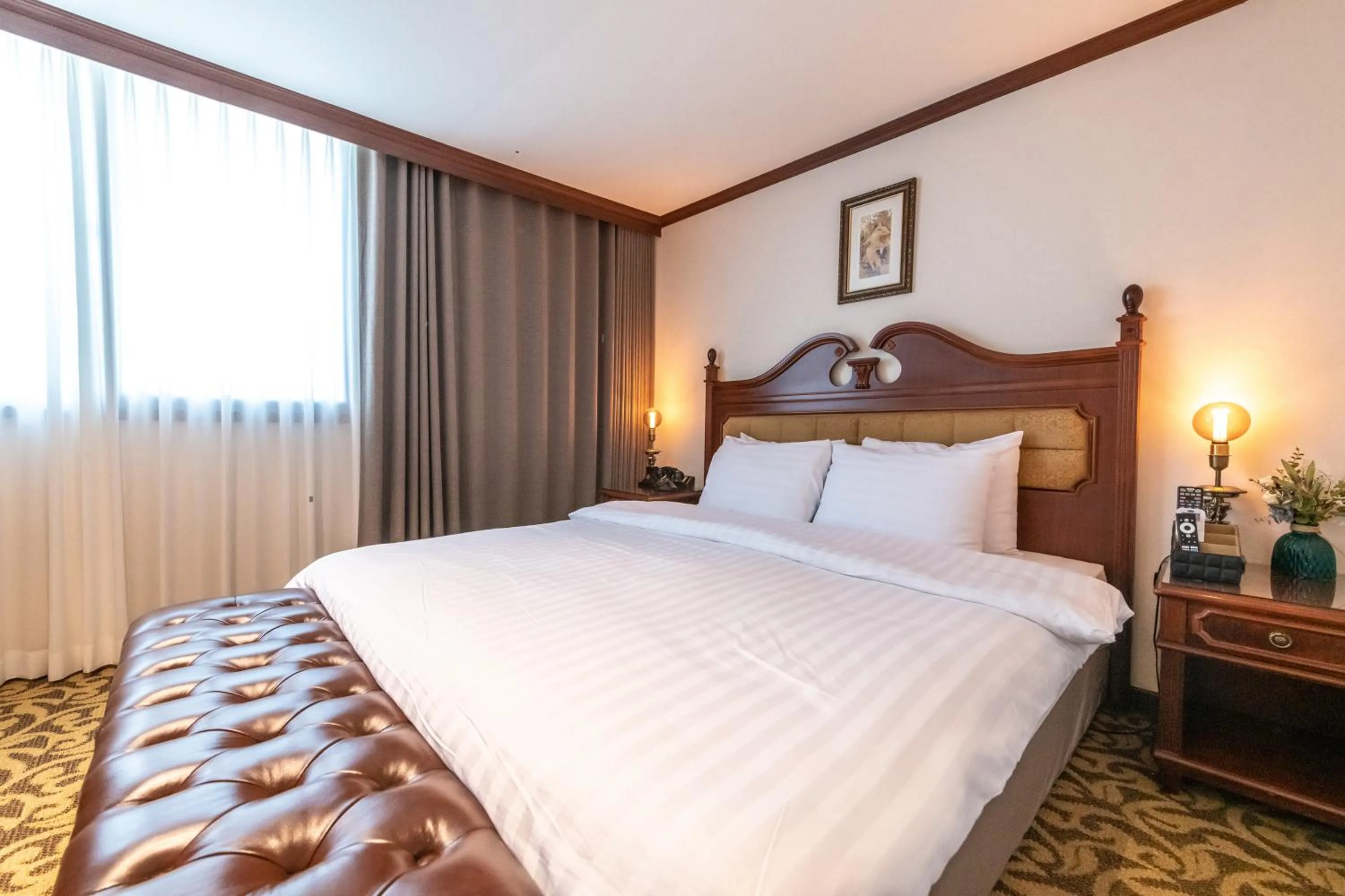 Bed in New Cheonji Hotel
