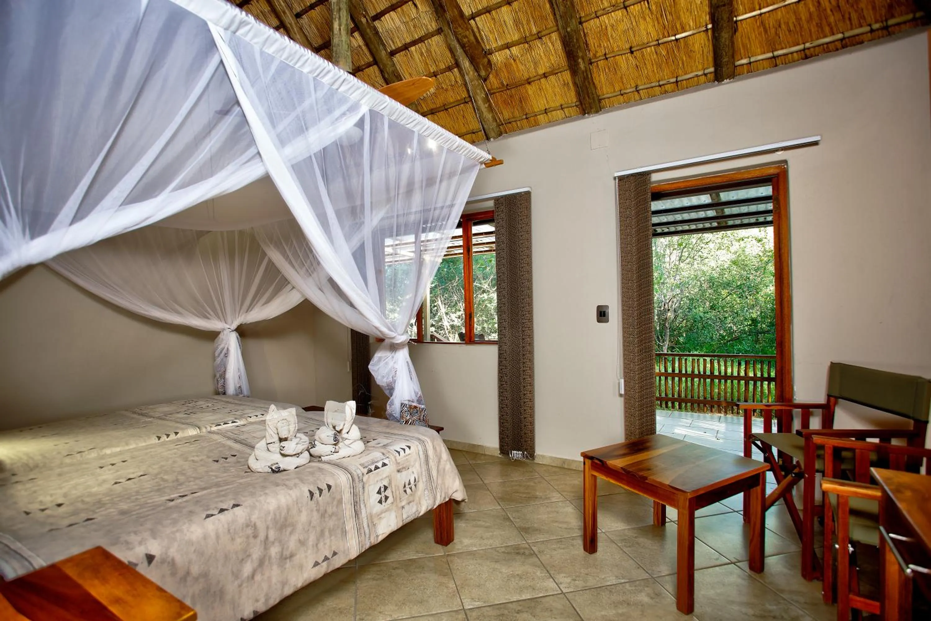 Bed in Kubu Safari Lodge