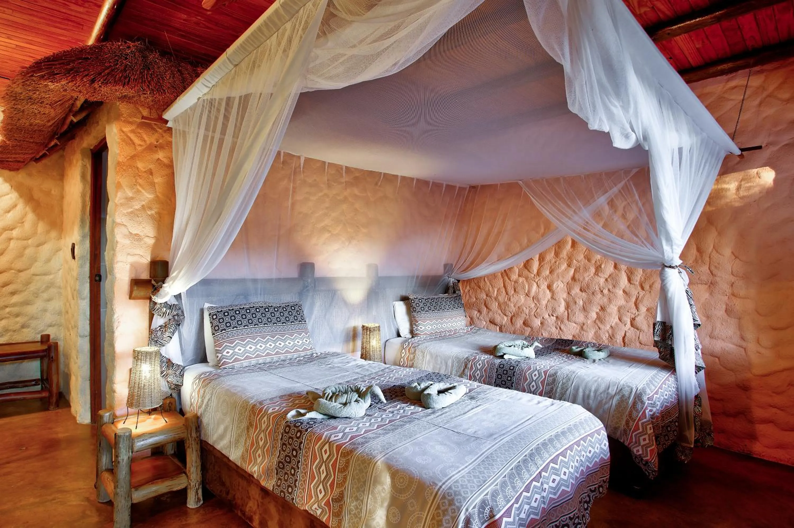 Bed in Kubu Safari Lodge