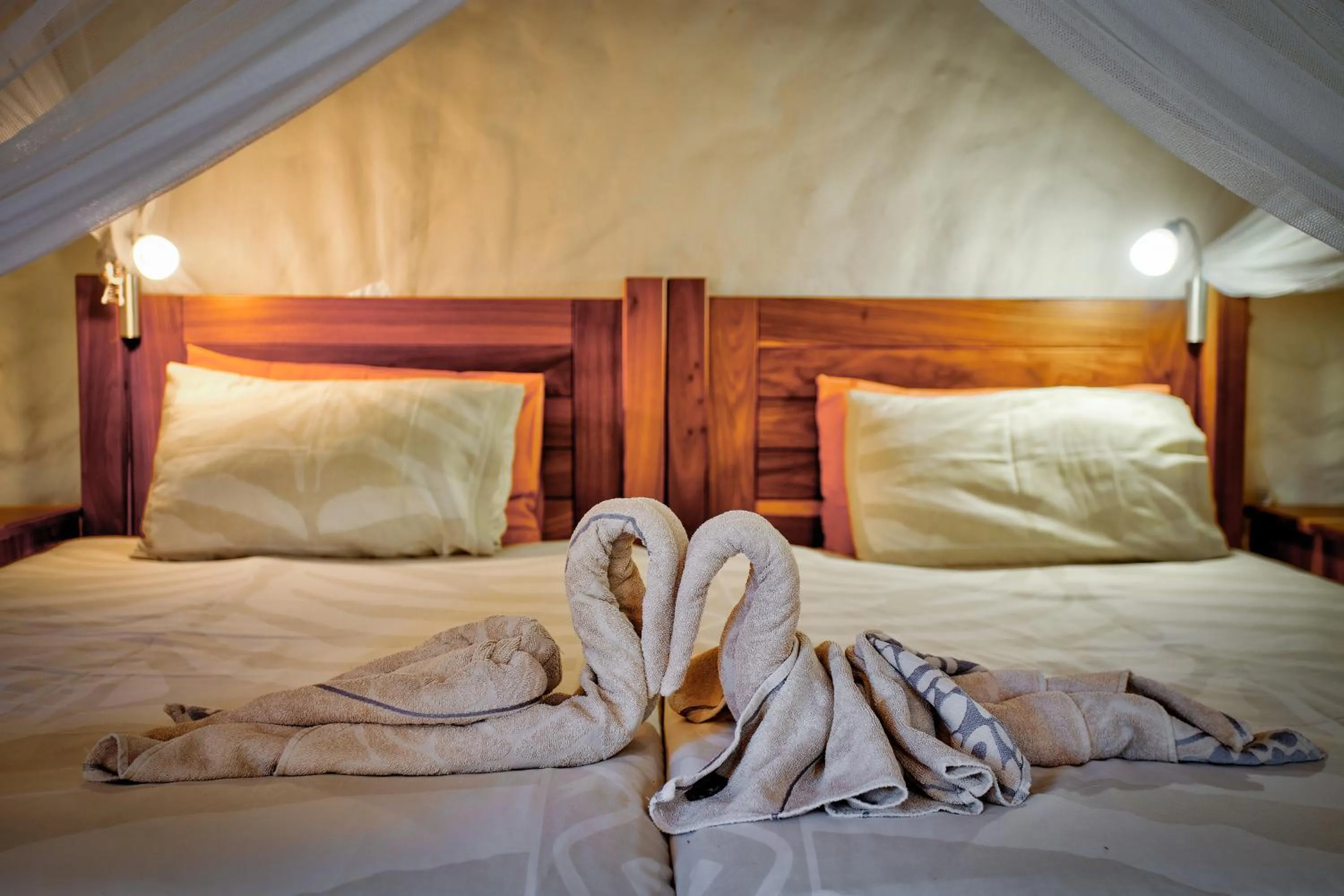 Bed in Kubu Safari Lodge