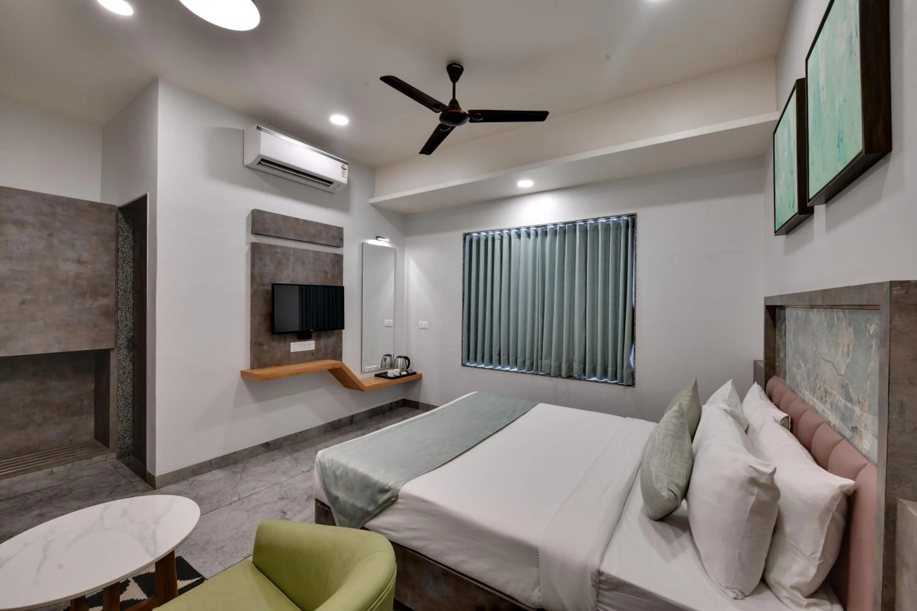 Bedroom in HOTEL RADHIKA