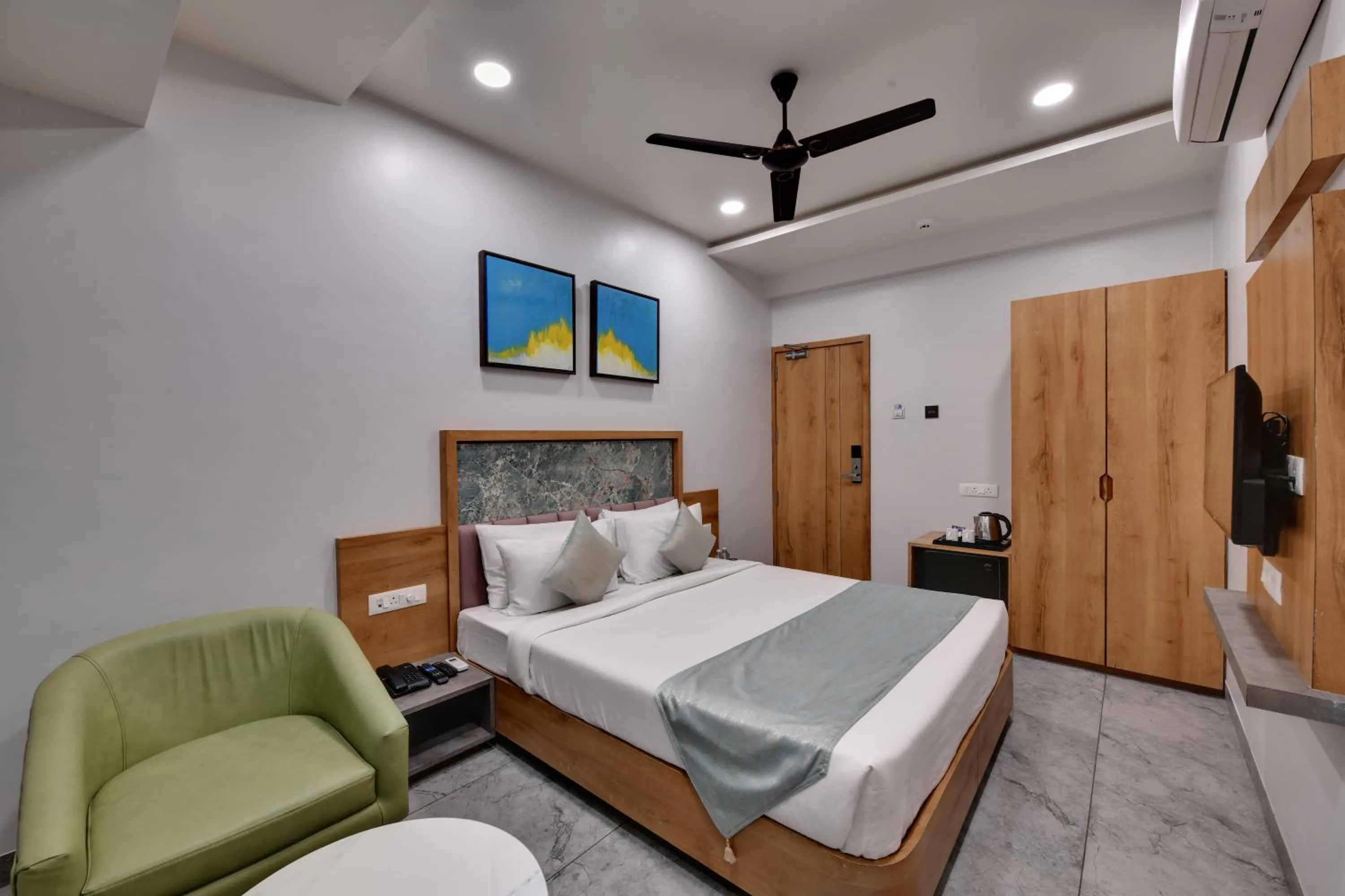 Bedroom in HOTEL RADHIKA