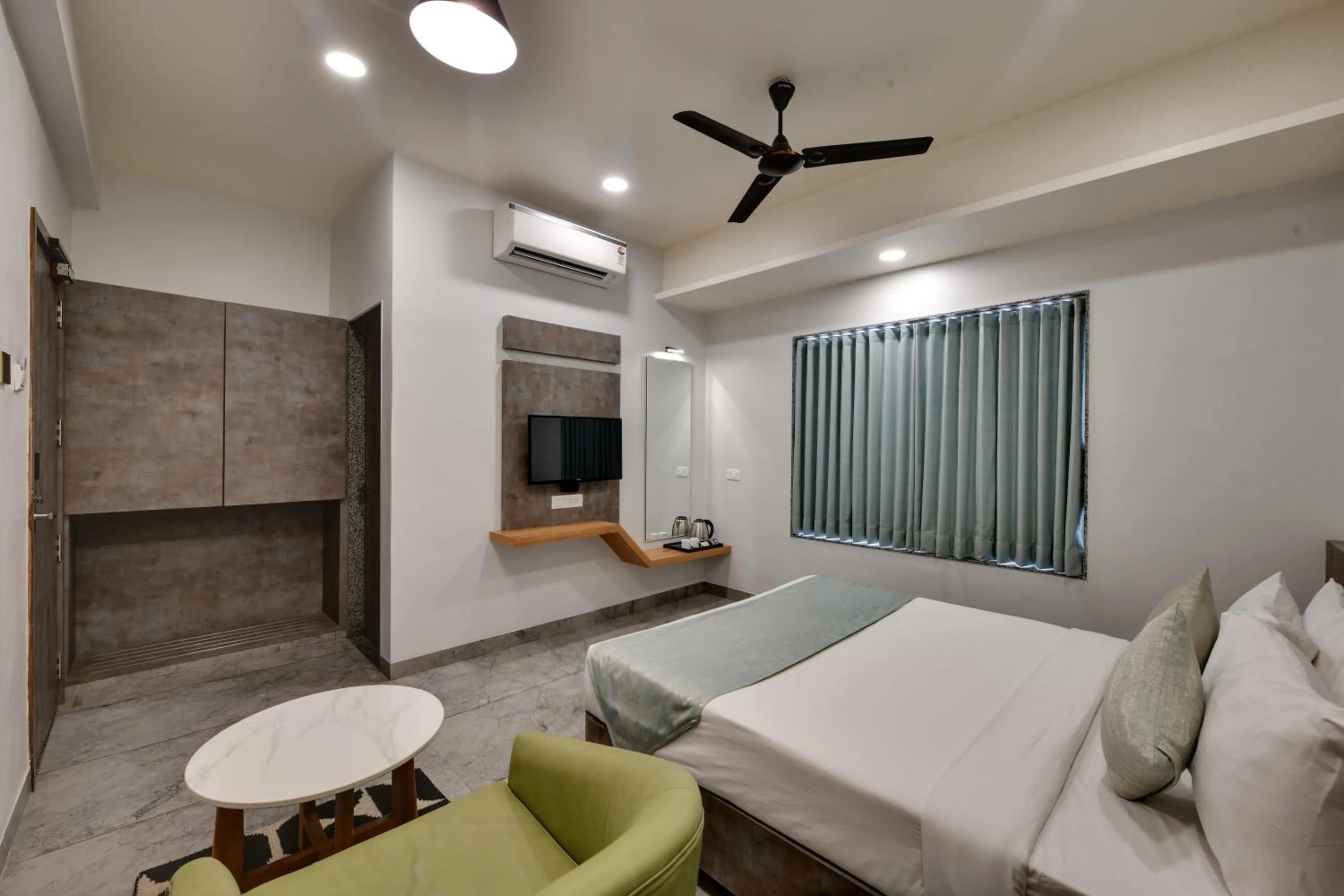 Bedroom in HOTEL RADHIKA