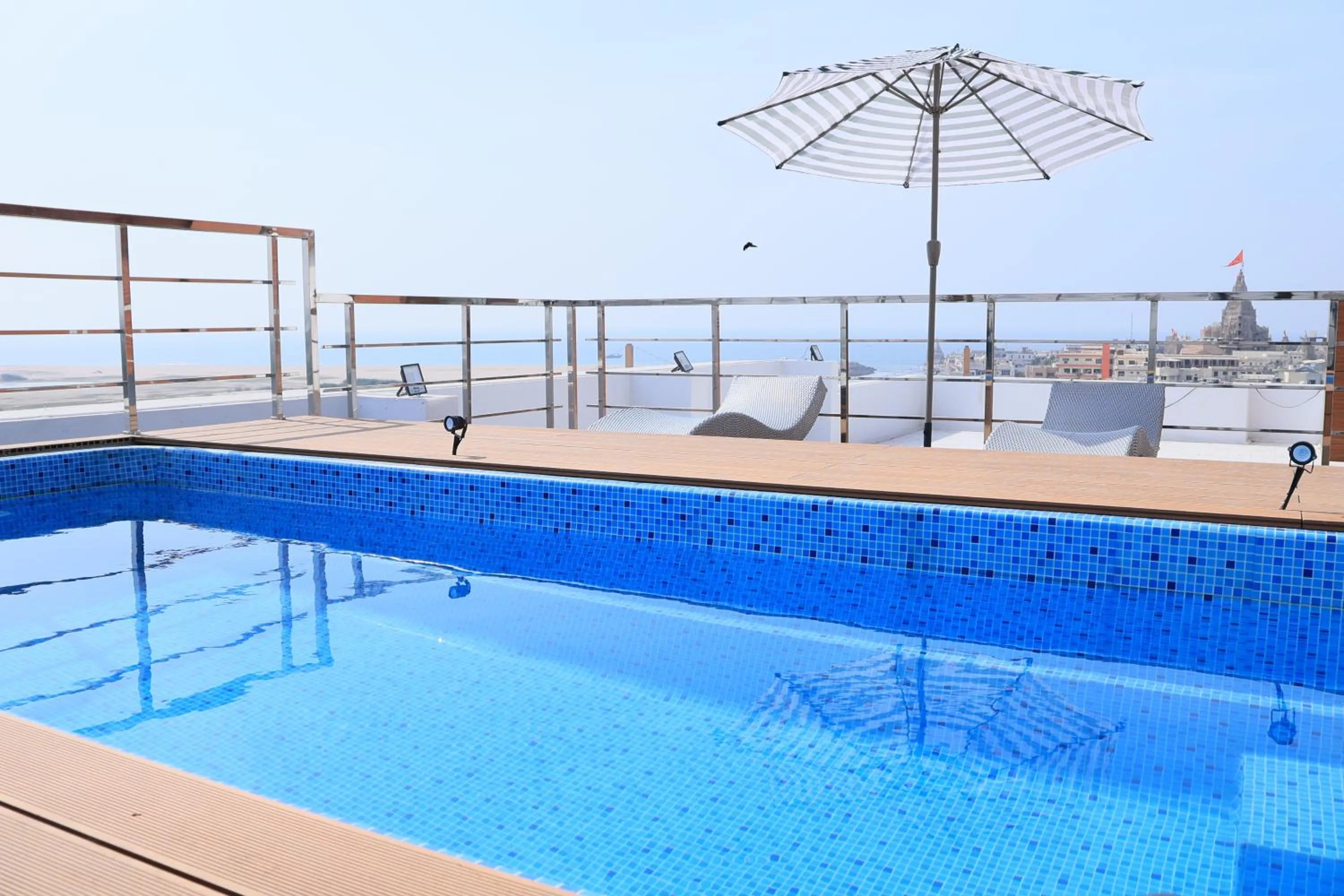 Swimming pool in Pride Elite Dwarka Near Dwarkadhish Temple