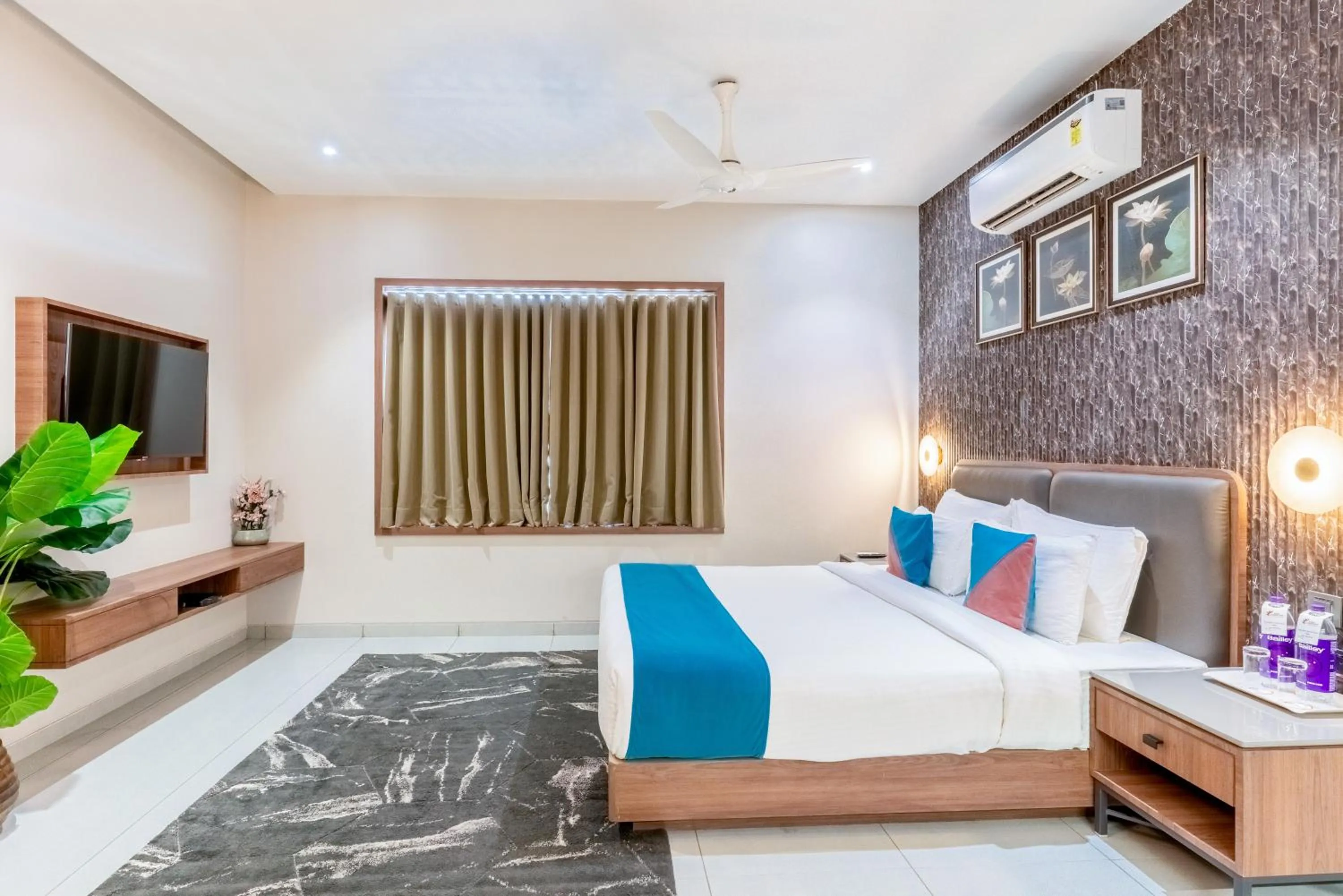 Bed in Pride Elite Dwarka Near Dwarkadhish Temple