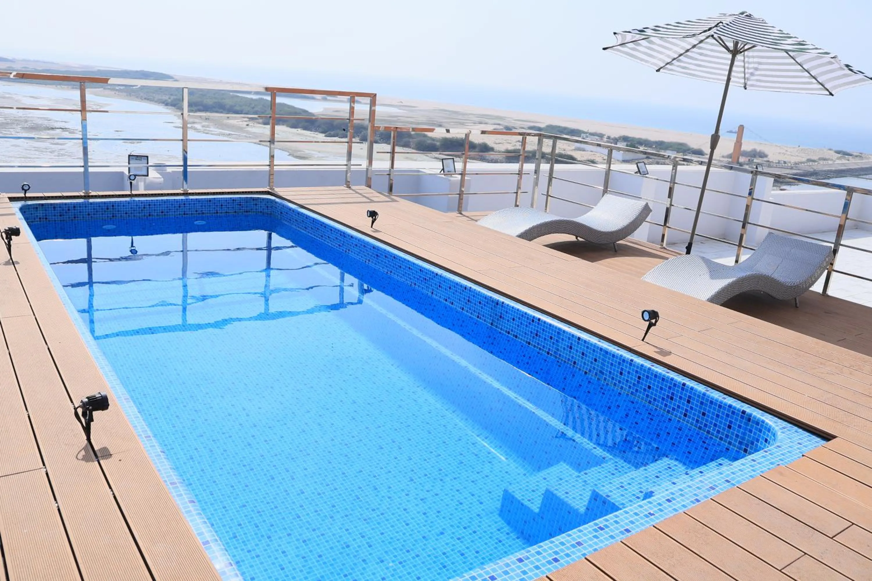 Swimming pool in Pride Elite Dwarka Near Dwarkadhish Temple