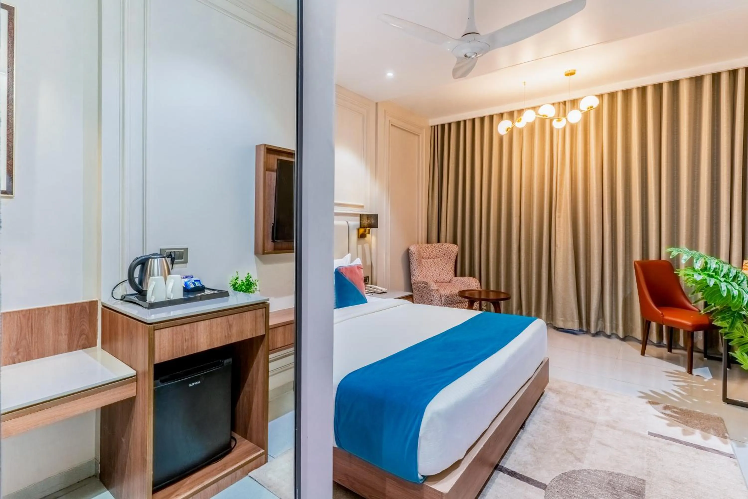 Bed in Pride Elite Dwarka Near Dwarkadhish Temple