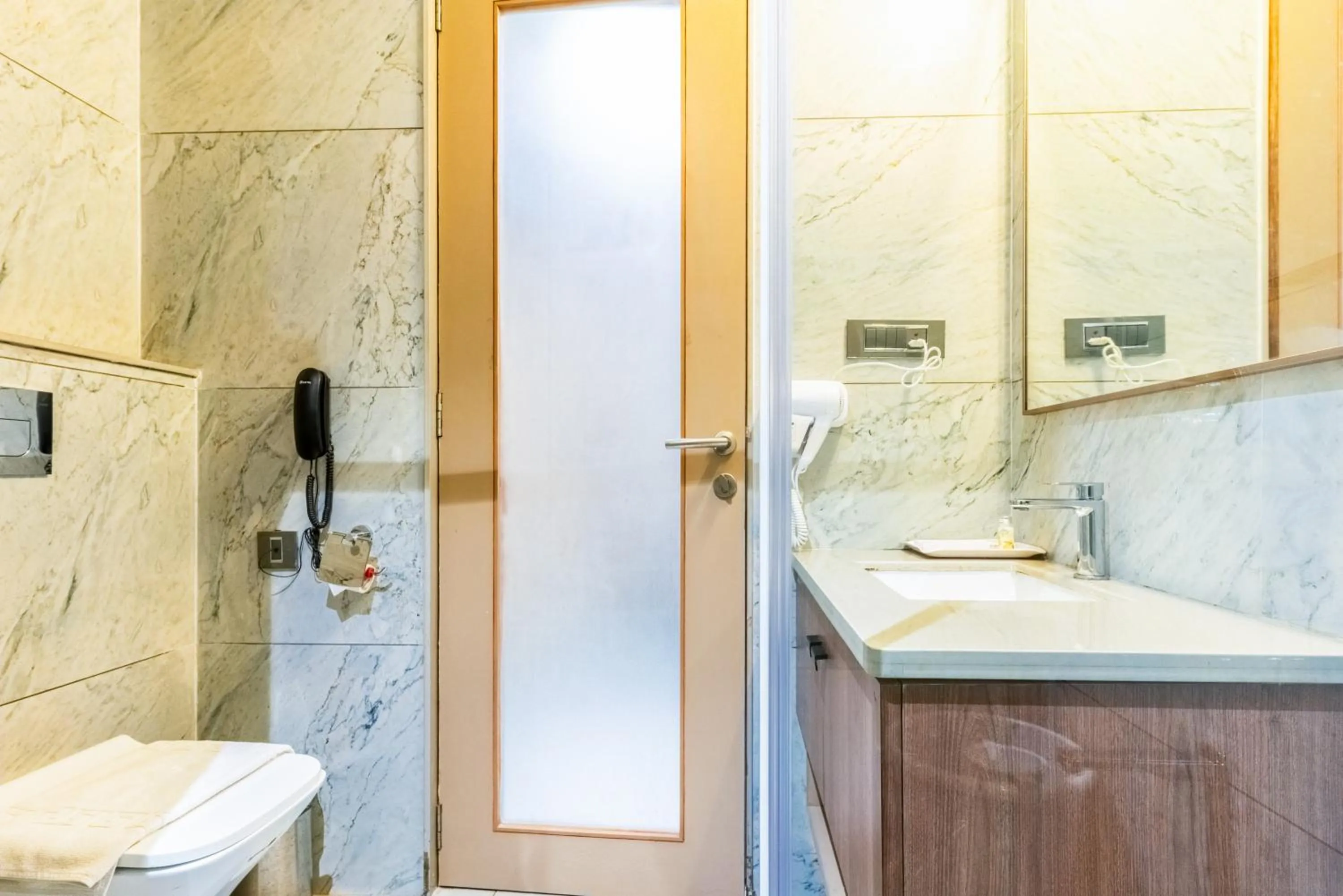 Bathroom in Pride Elite Dwarka Near Dwarkadhish Temple