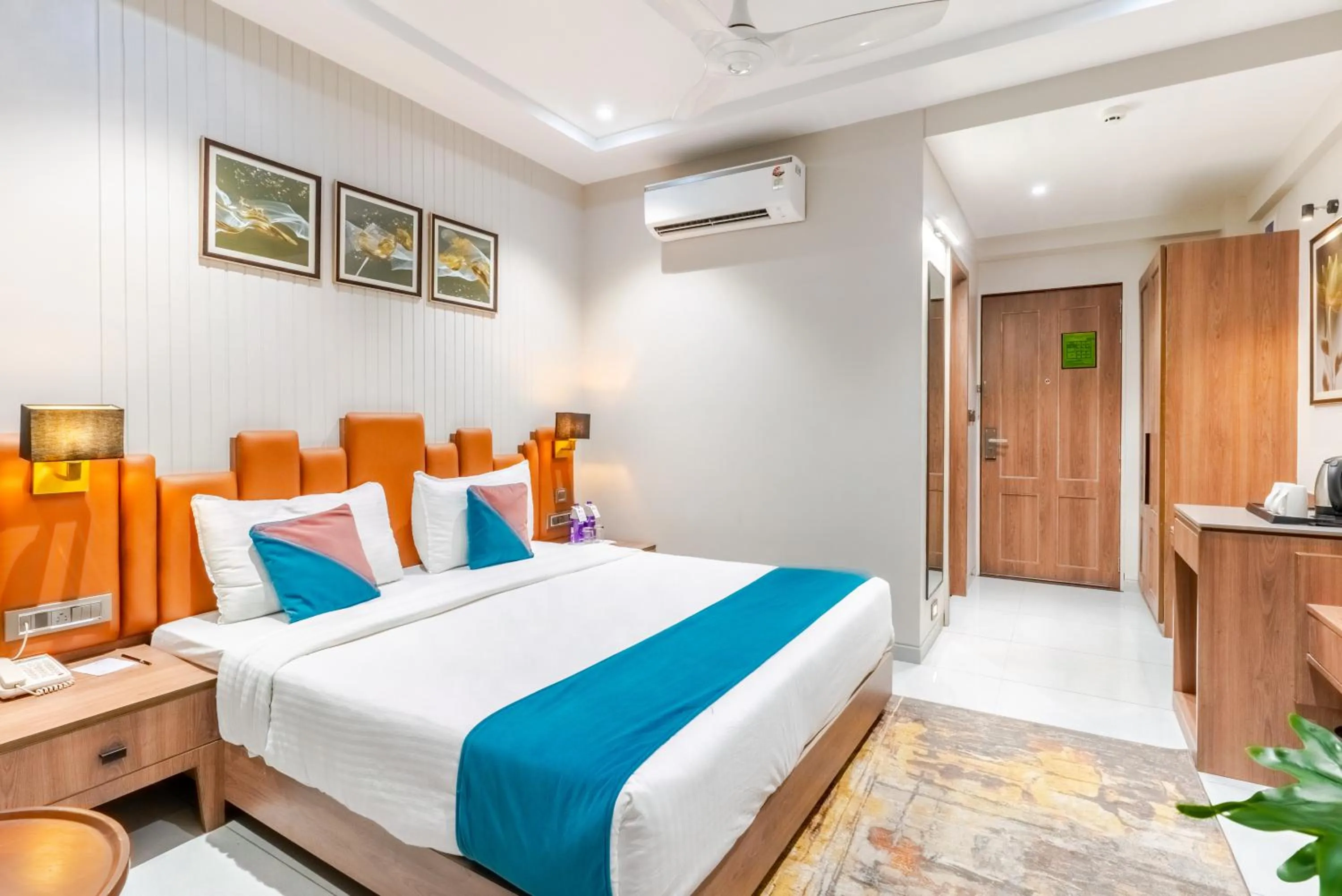 Photo of the whole room, Bed in Pride Elite Dwarka Near Dwarkadhish Temple