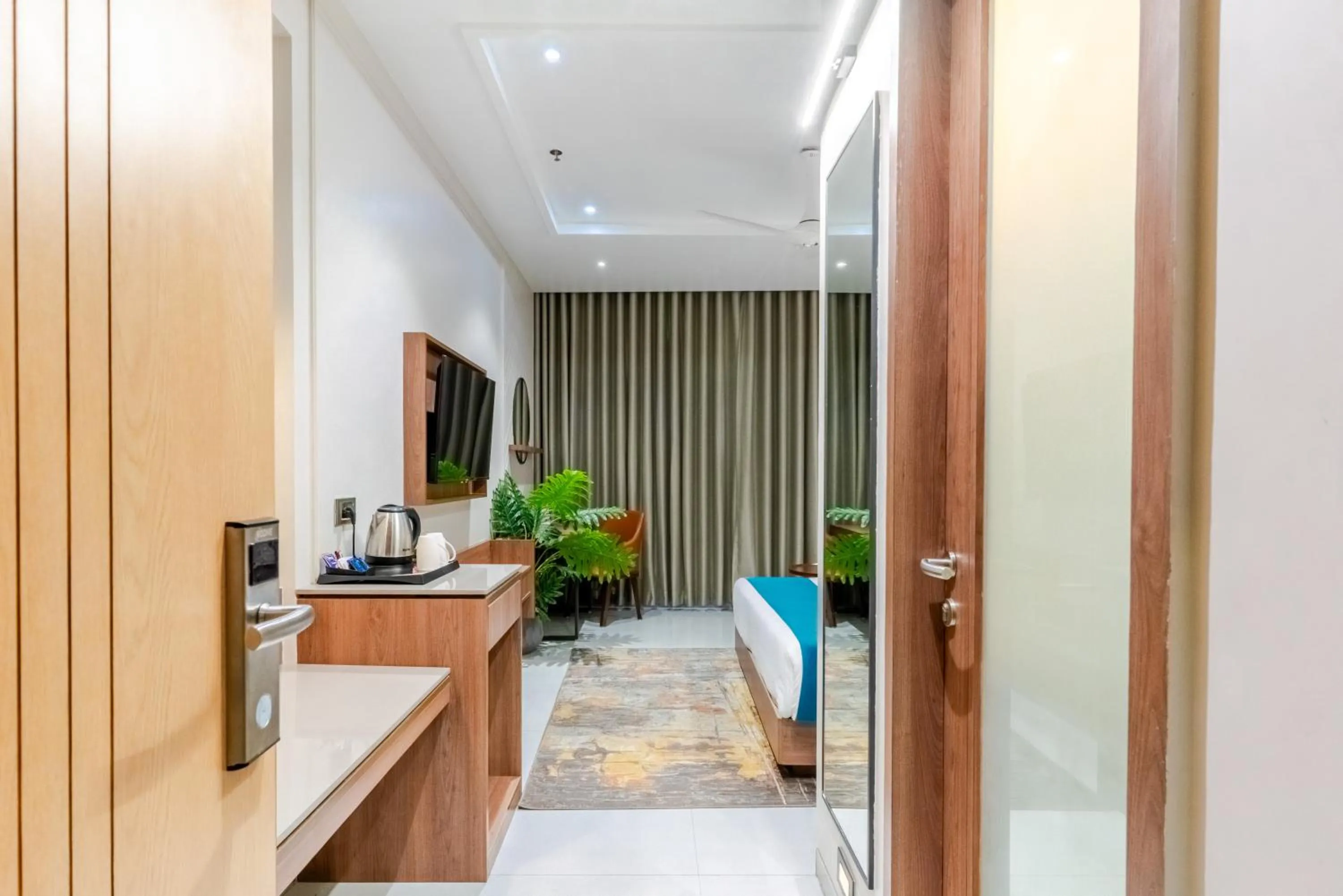 Bed in Pride Elite Dwarka Near Dwarkadhish Temple