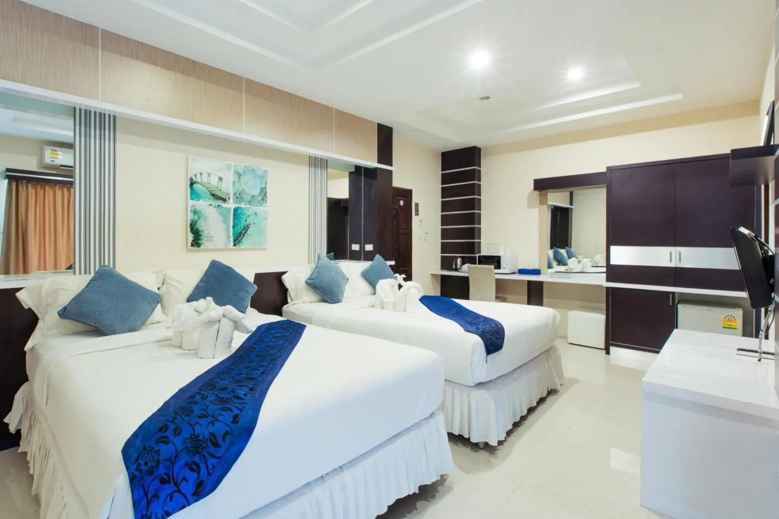 Bed in Excella Hotel