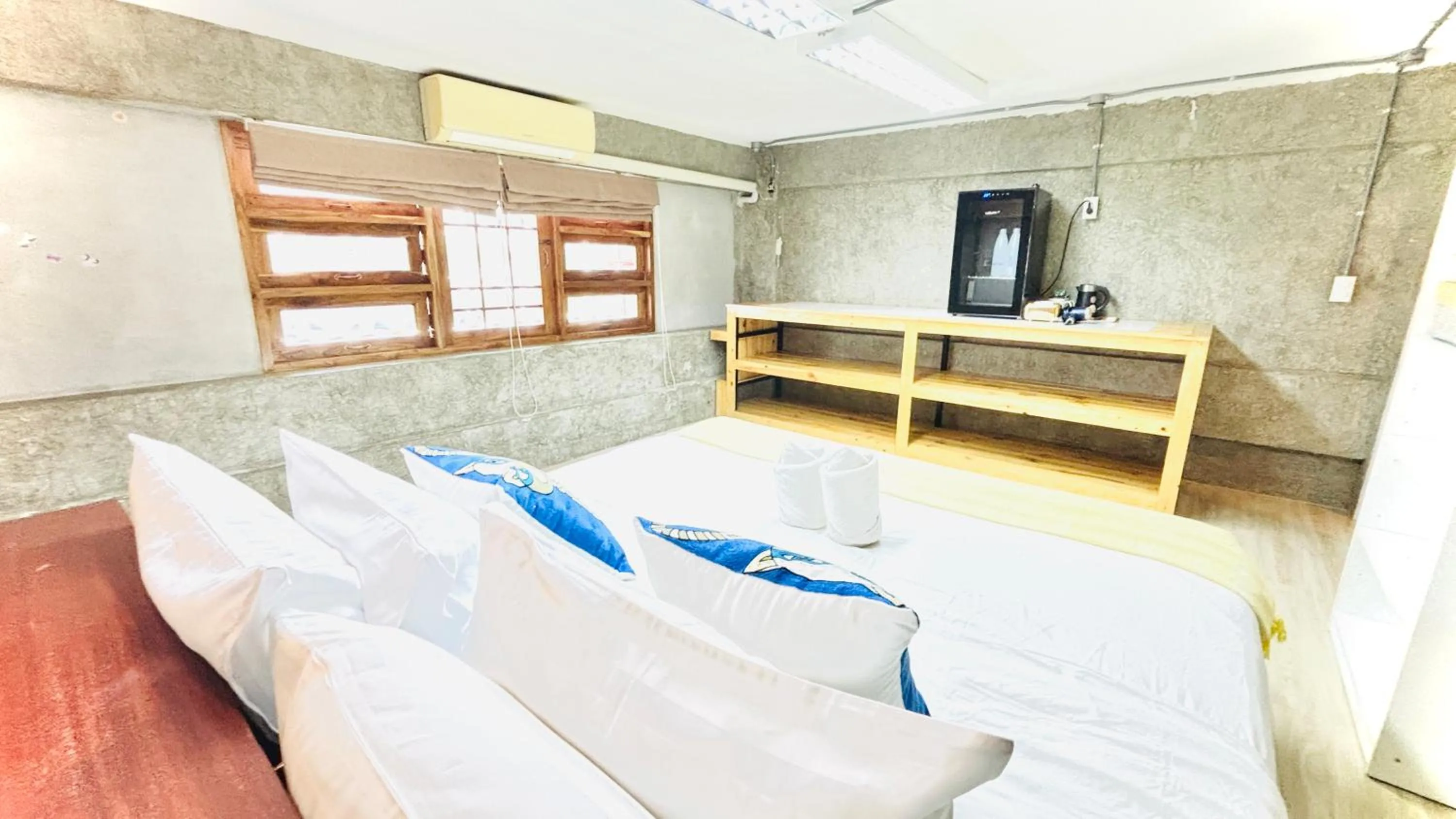 Bed in The Yak Cozy Chiang Mai