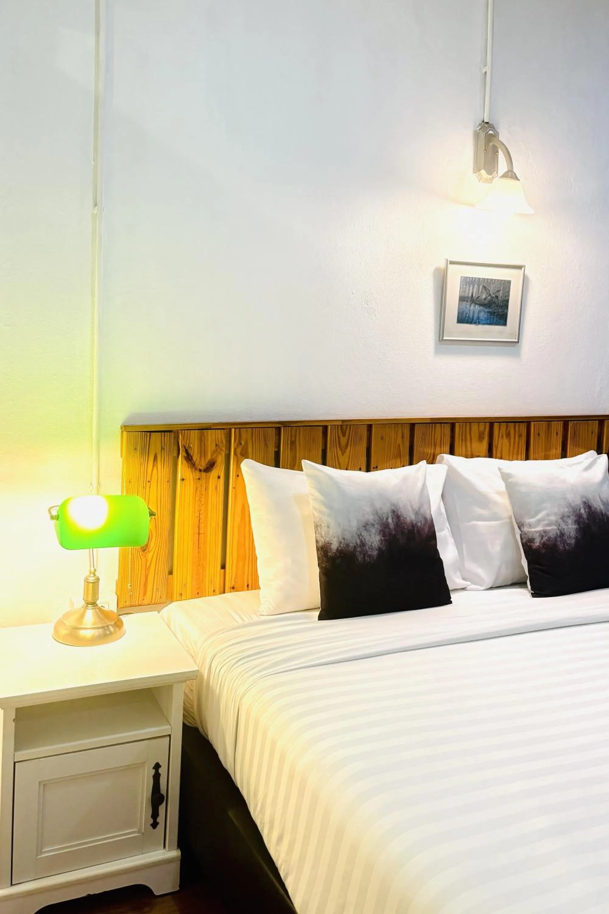 Bed in The Yak Cozy Chiang Mai