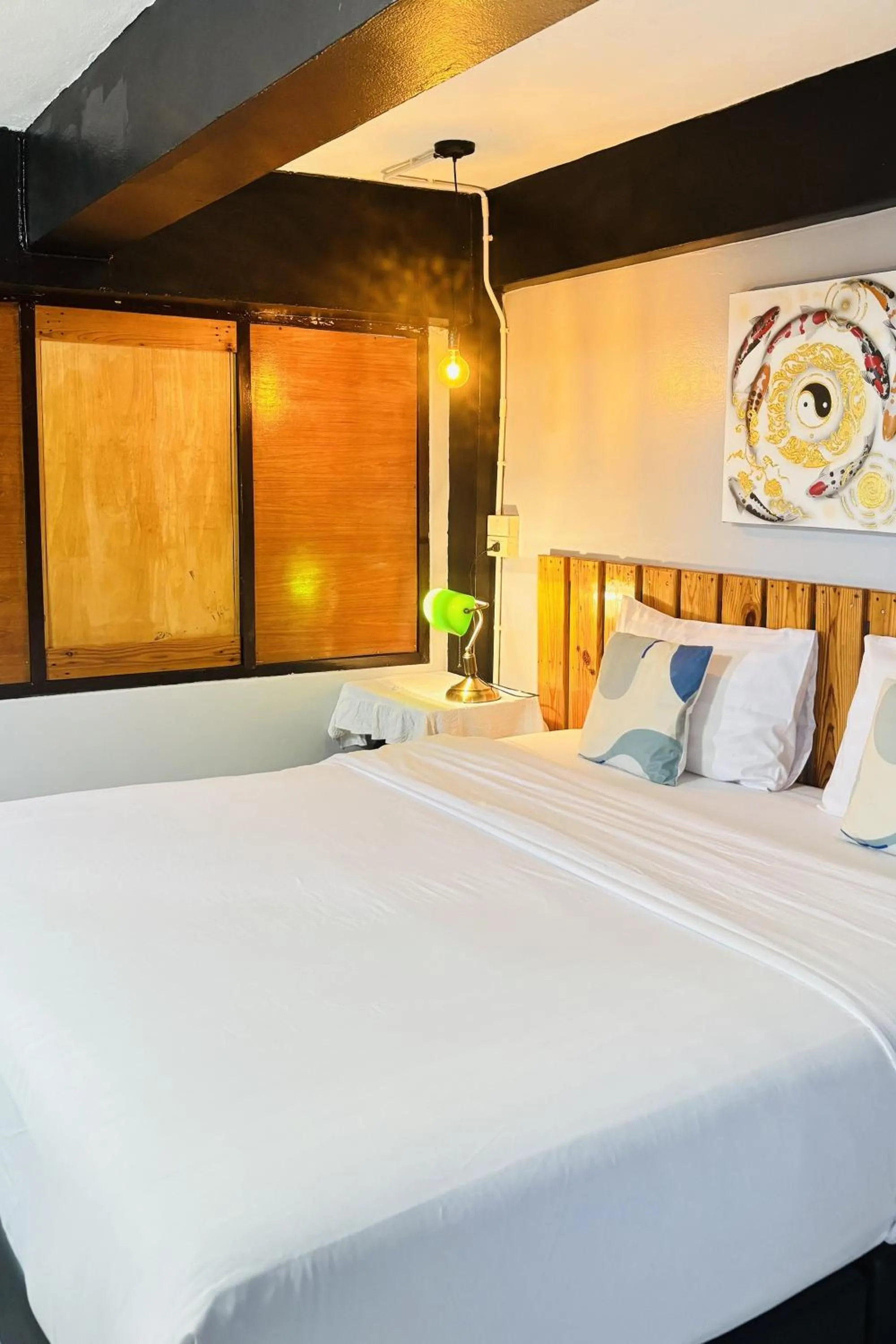 Bed in The Yak Cozy Chiang Mai