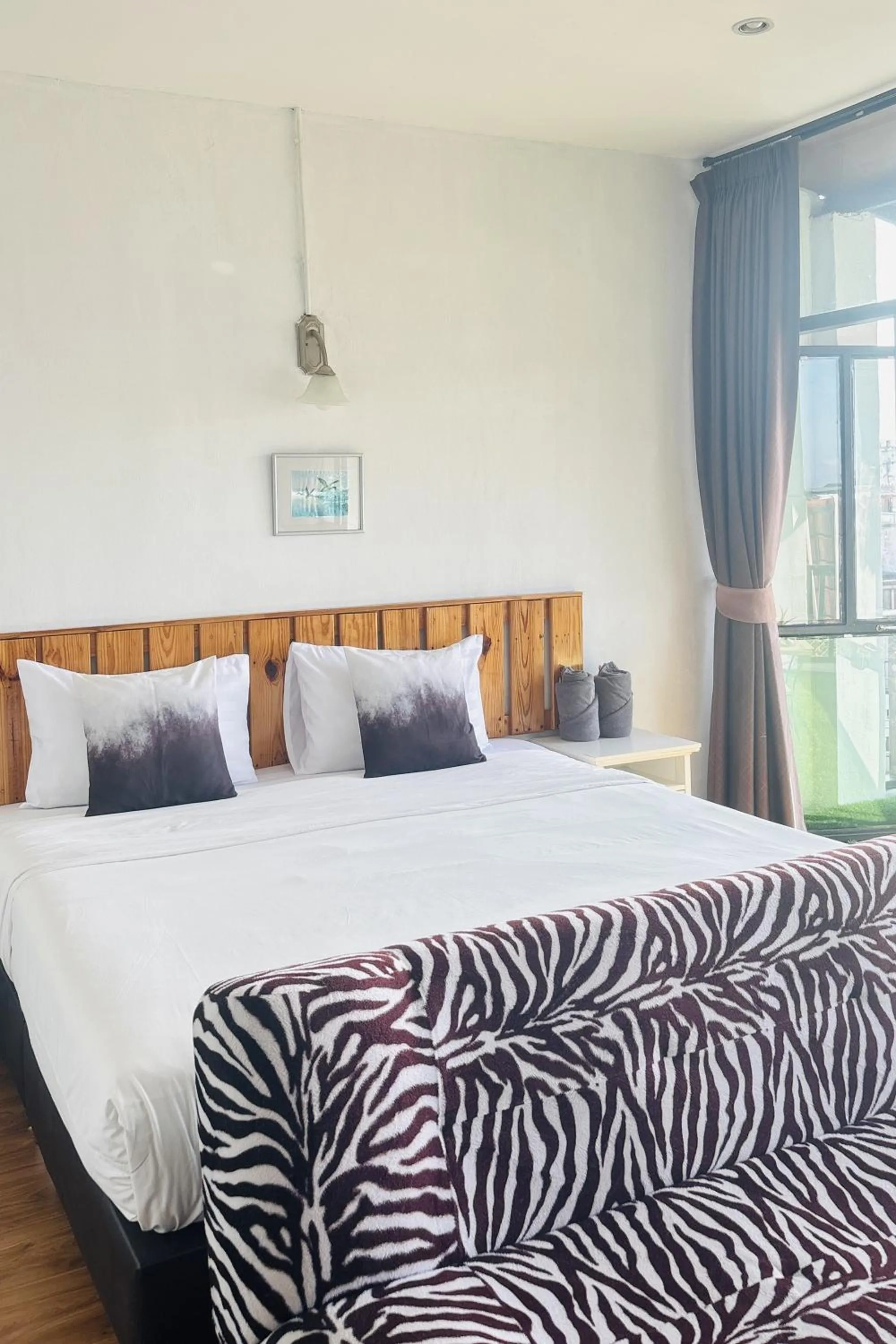 Bed in The Yak Cozy Chiang Mai