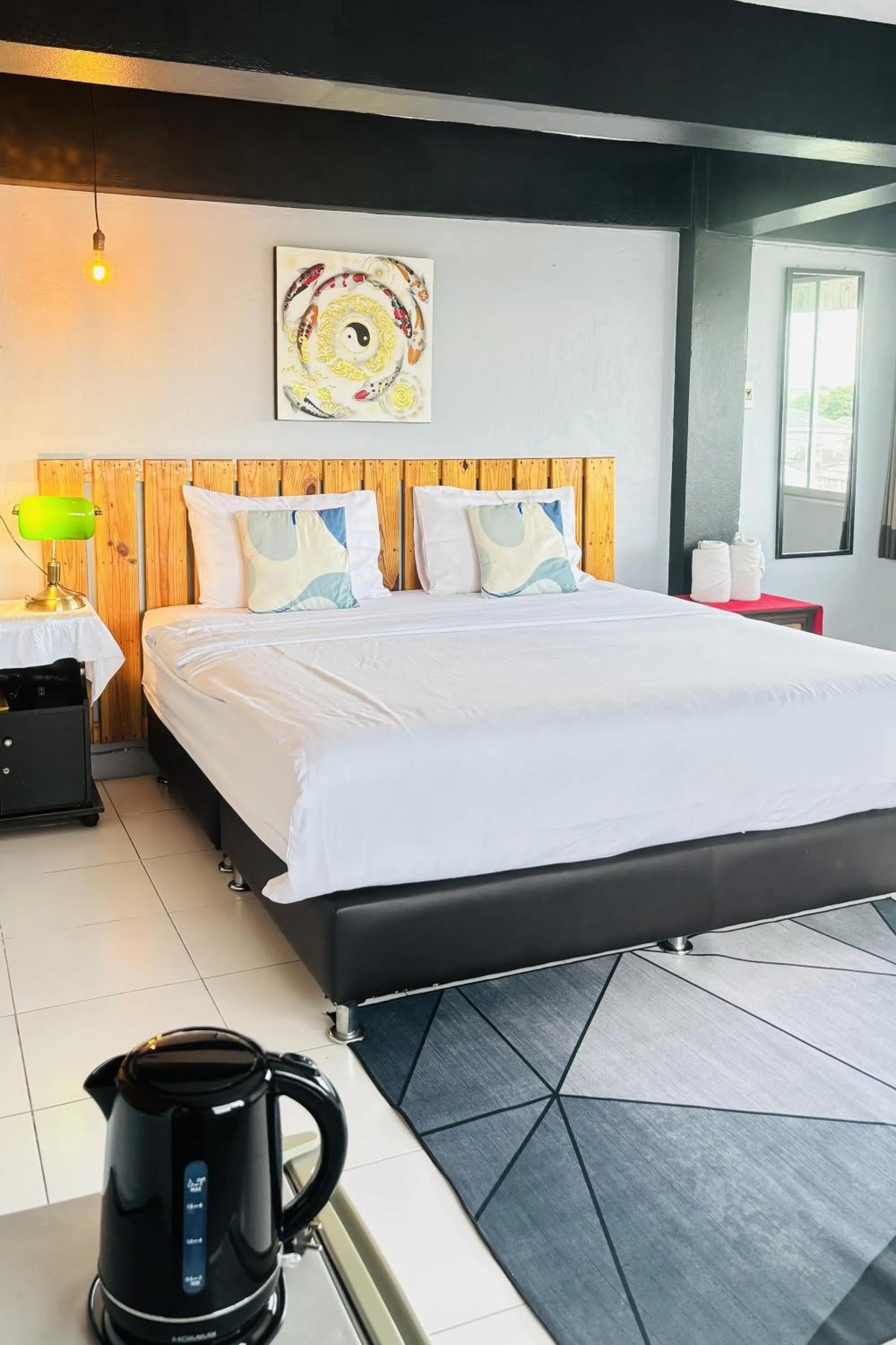 Bed in The Yak Cozy Chiang Mai