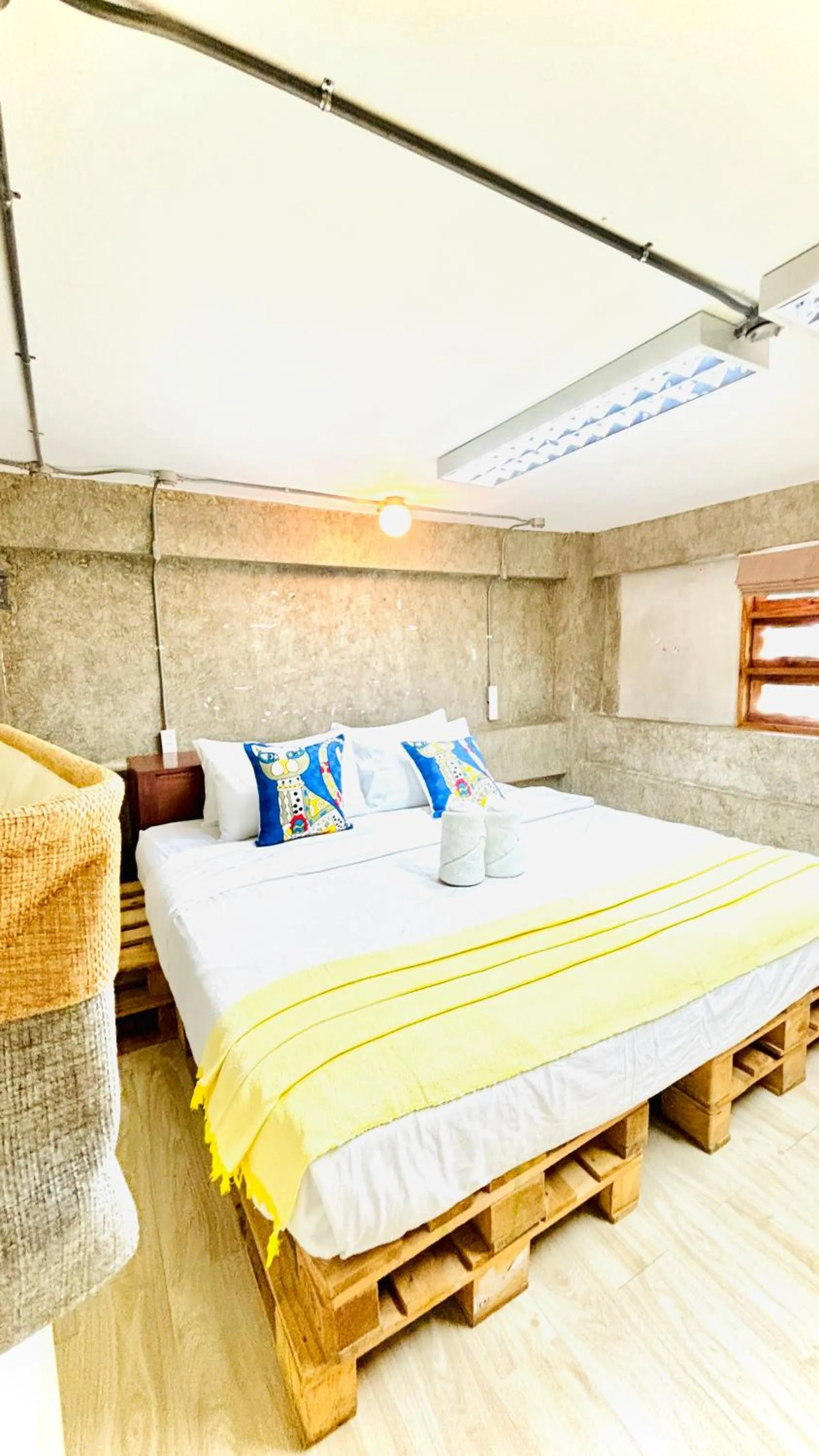 Bed in The Yak Cozy Chiang Mai