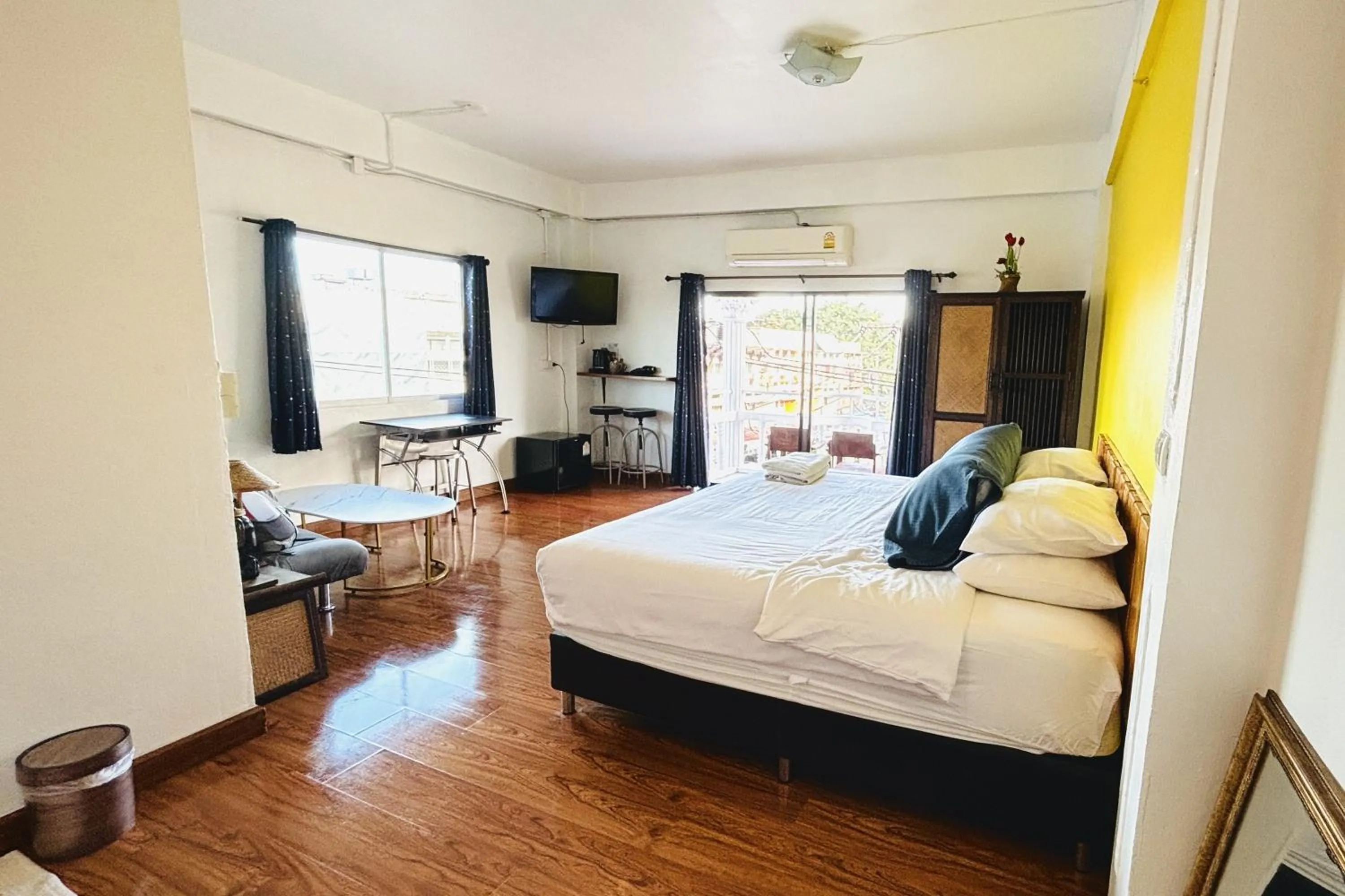 Bed in The Yak Cozy Chiang Mai