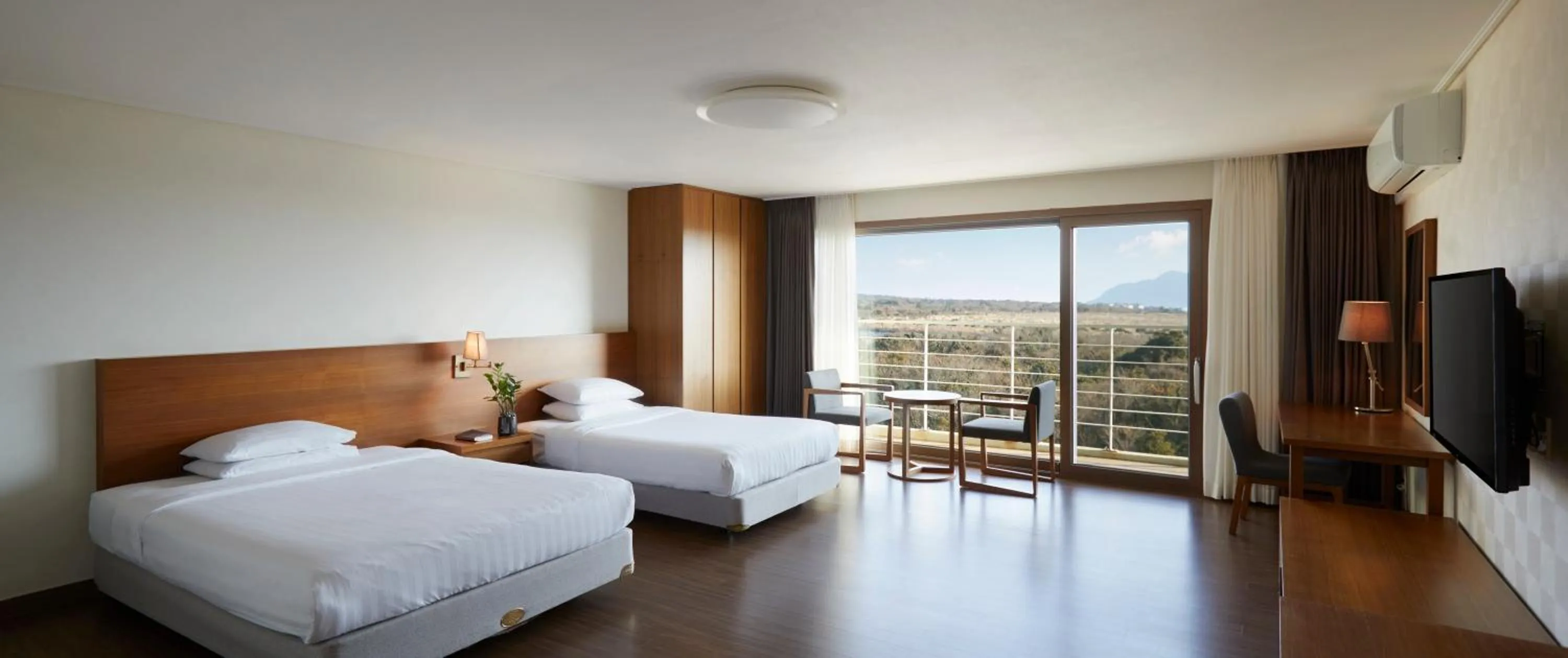 Bed in Jeju Aerospace Hotel