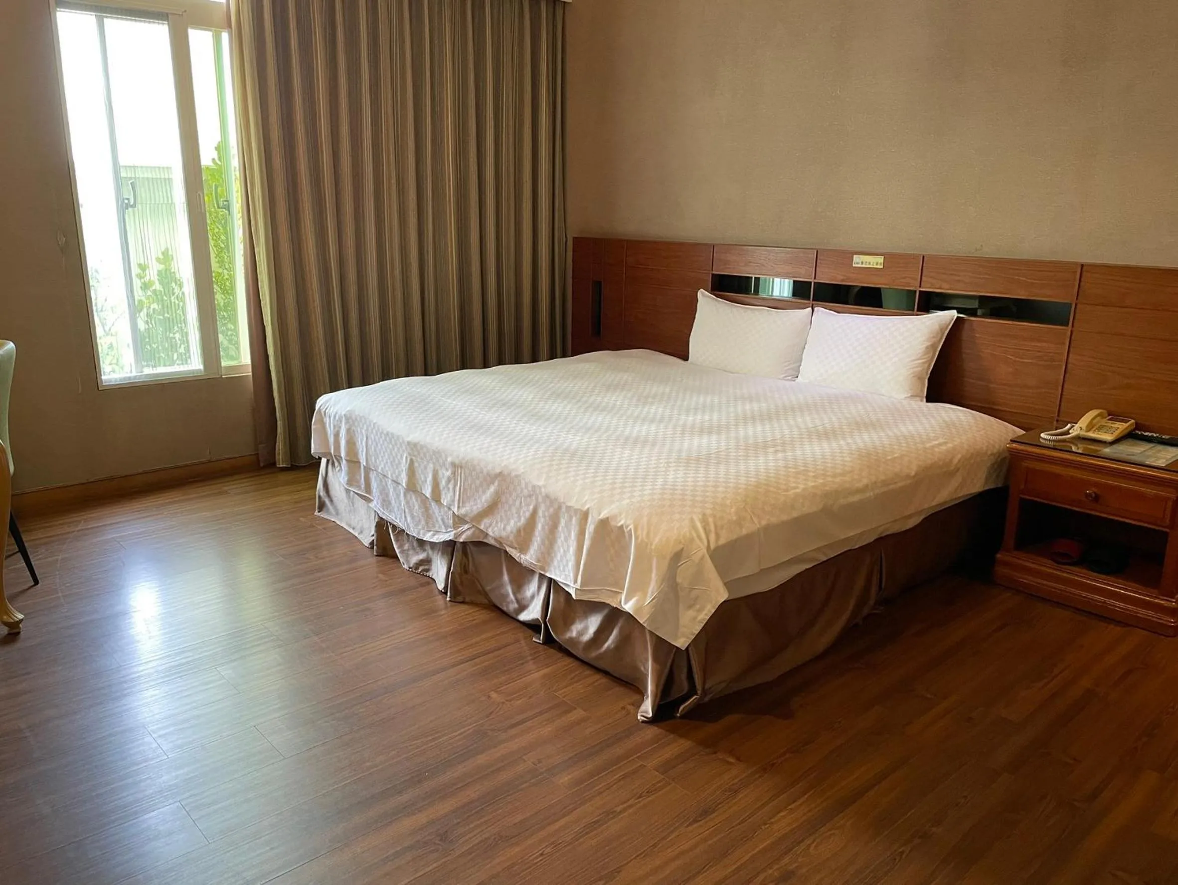 Bed in 嘉義戴斯精選酒店 原稱佳仕堡