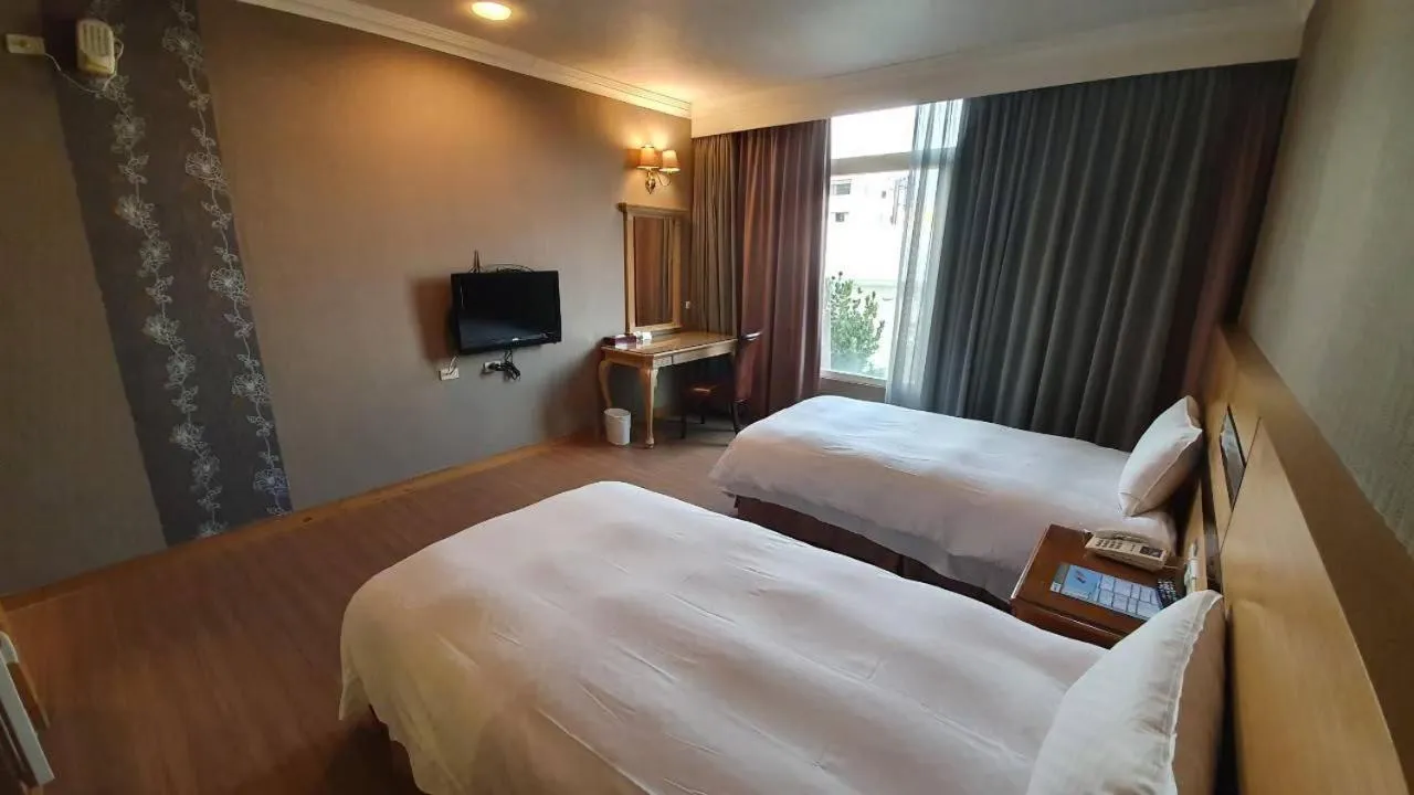 Bed in 嘉義戴斯精選酒店 原稱佳仕堡