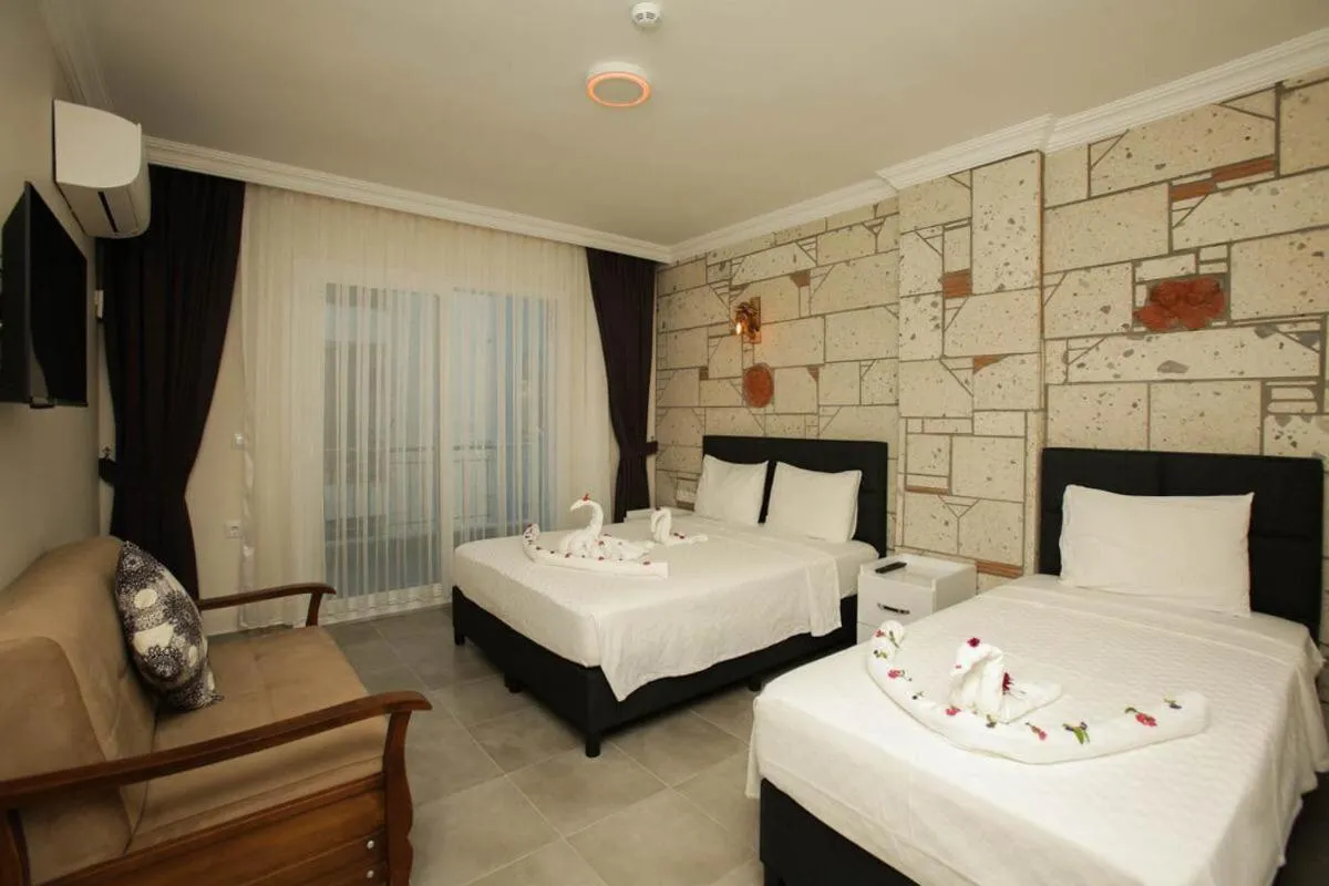 Bed in Lebedos Apart Hotel 1