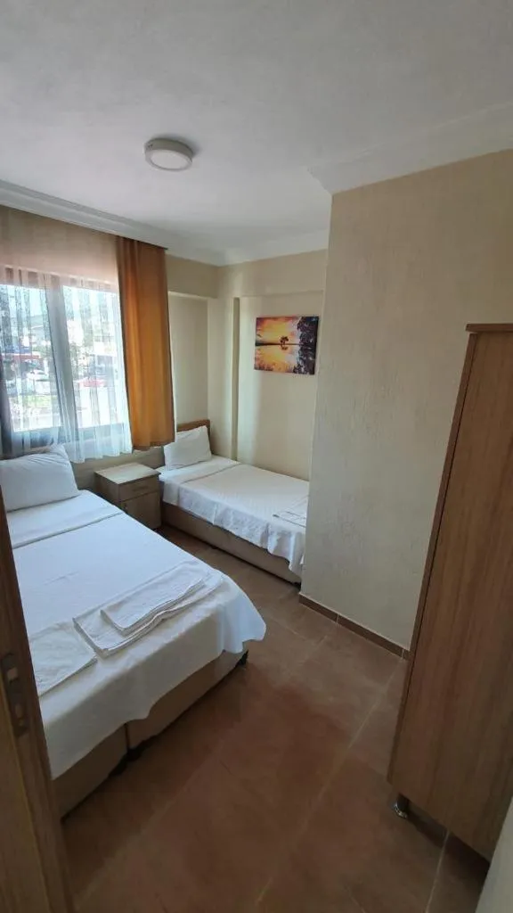 Bed in Lebedos Apart Hotel 1