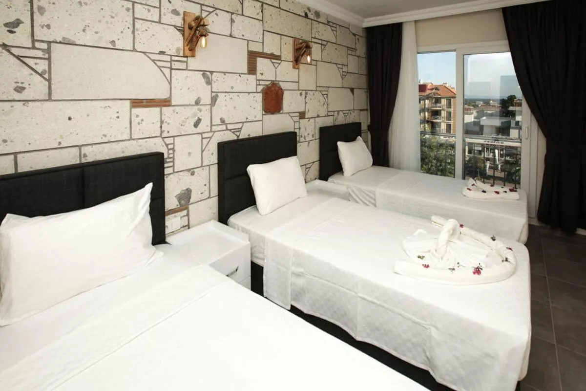 Bed in Lebedos Apart Hotel 1
