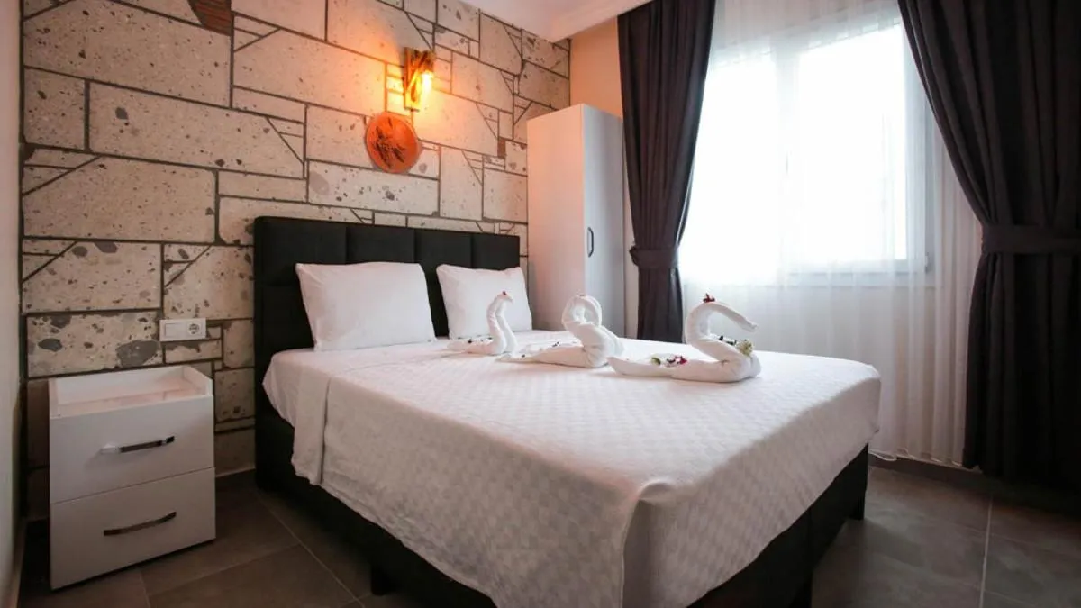 Bed in Lebedos Apart Hotel 1