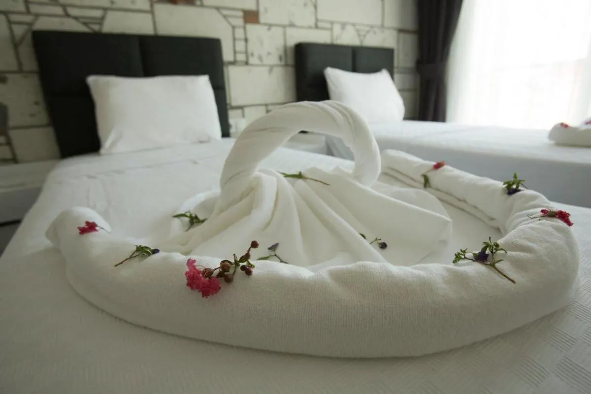 Bed in Lebedos Apart Hotel 1