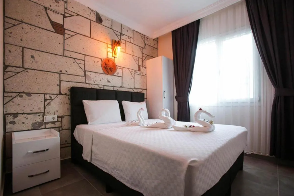 Bed in Lebedos Apart Hotel 1