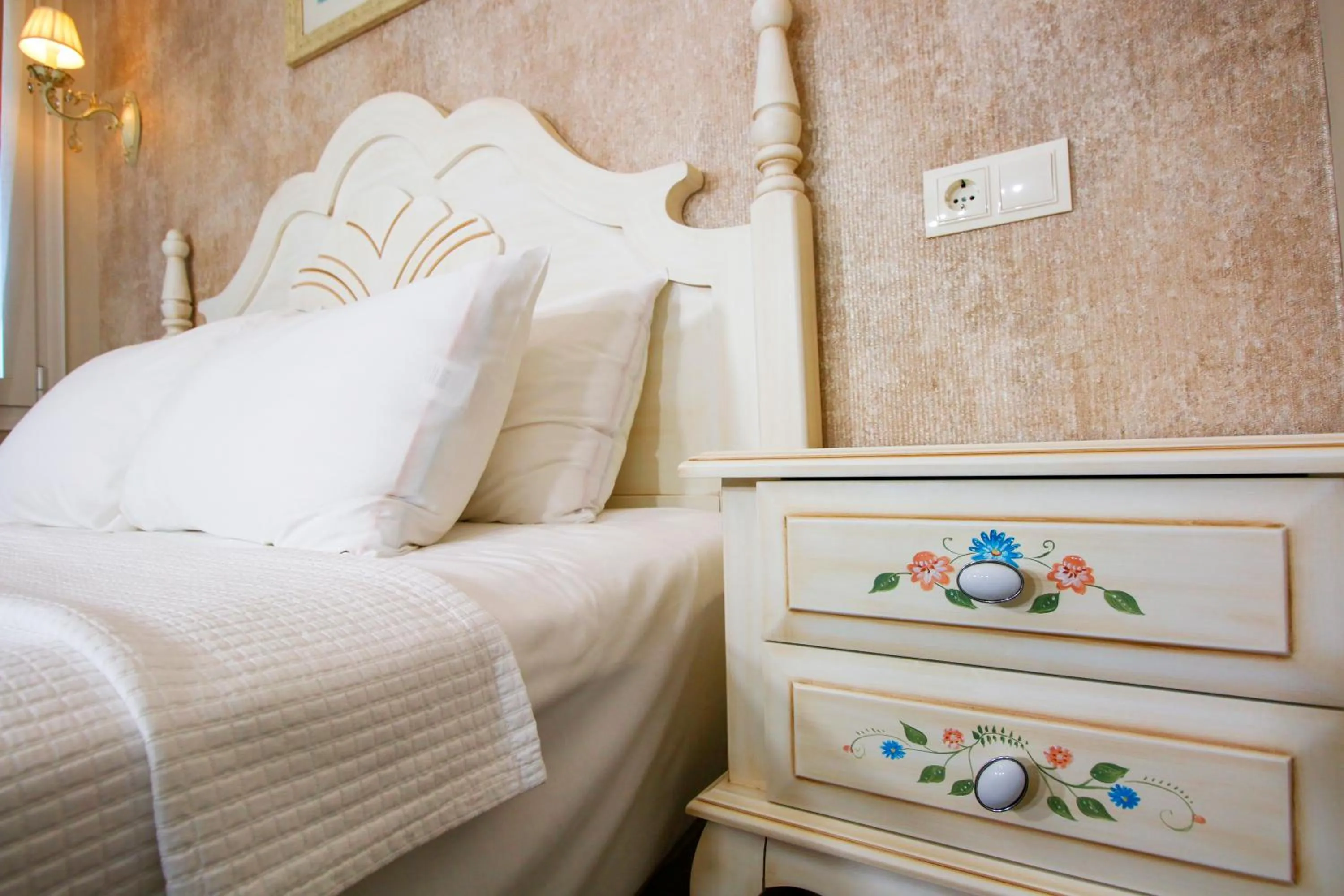 Bed in Joya Del Mar Hotel