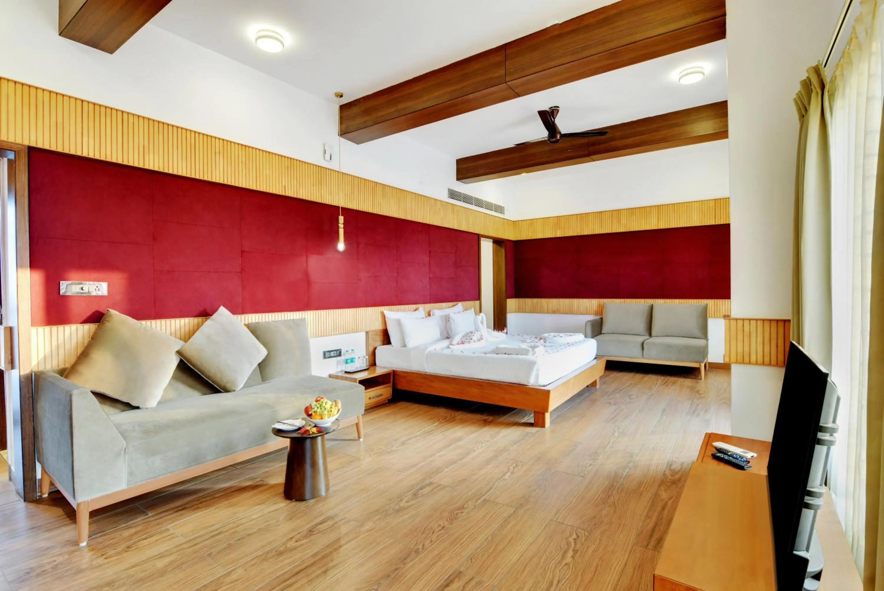 Seating area, Bed in Sportico Resort Bangalore