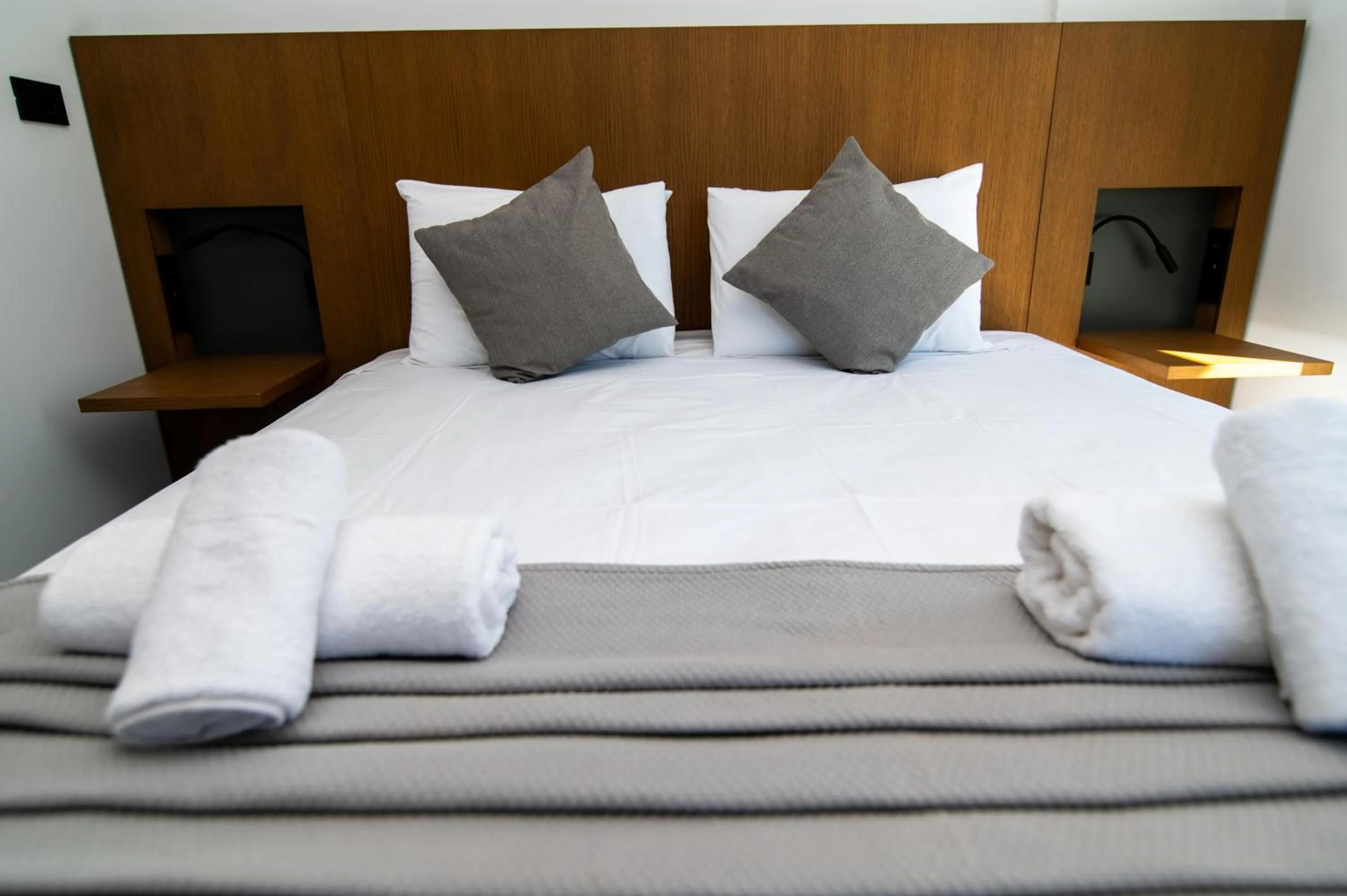 Bed in Jasmine Hotel Apartments