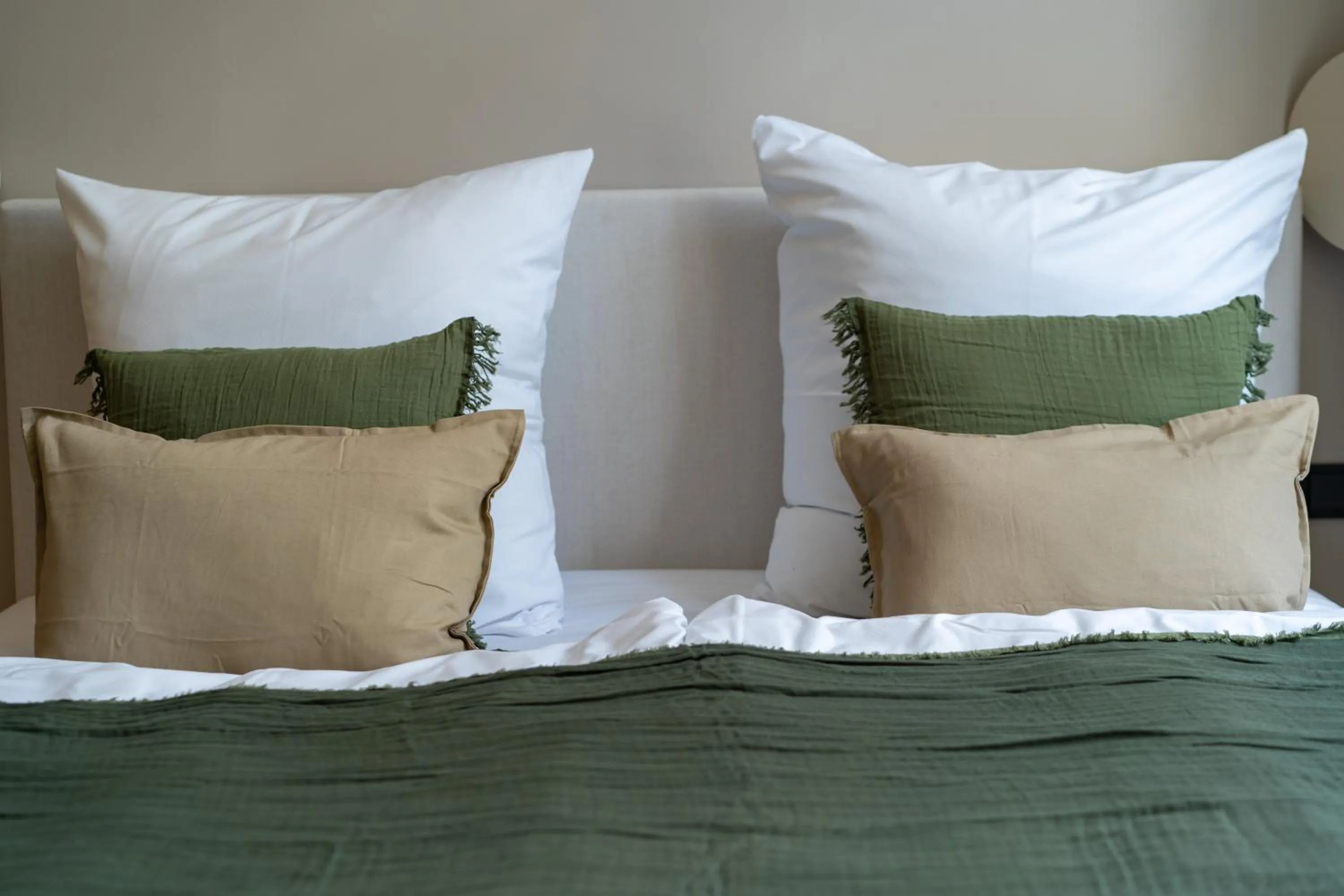 Bed in The Charming by Curt Suites