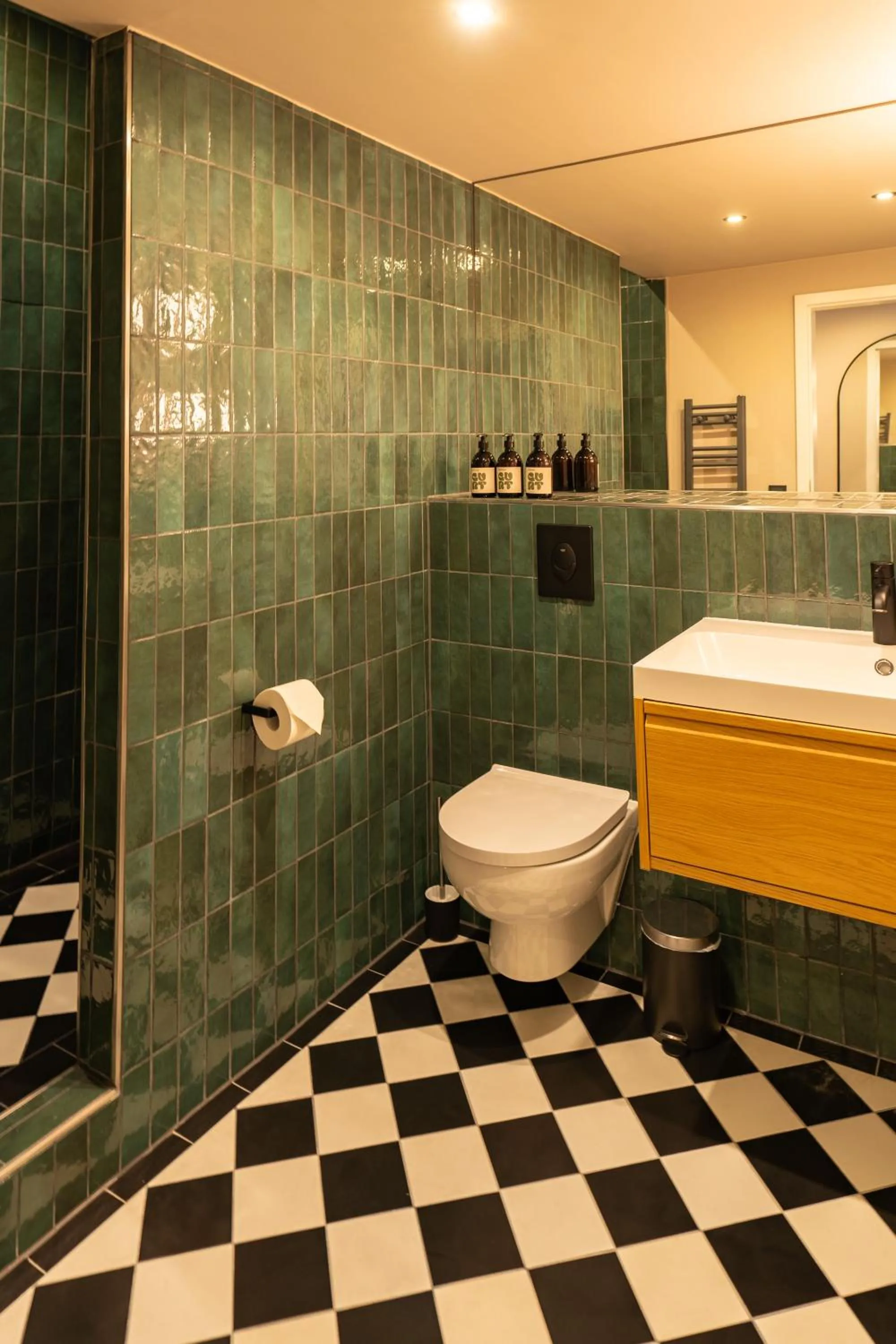 Bathroom in The Charming by Curt Suites