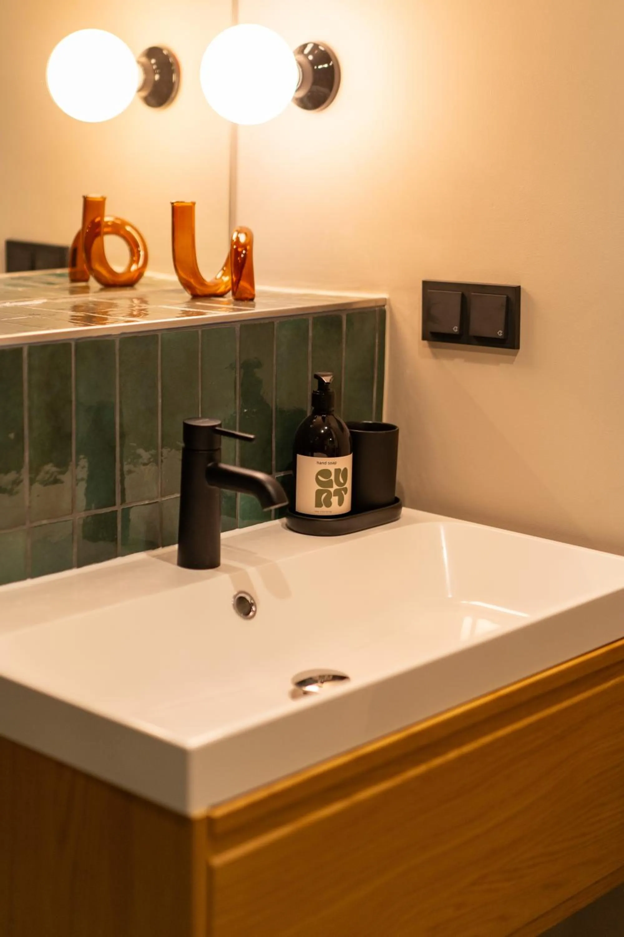 Bathroom in The Charming by Curt Suites